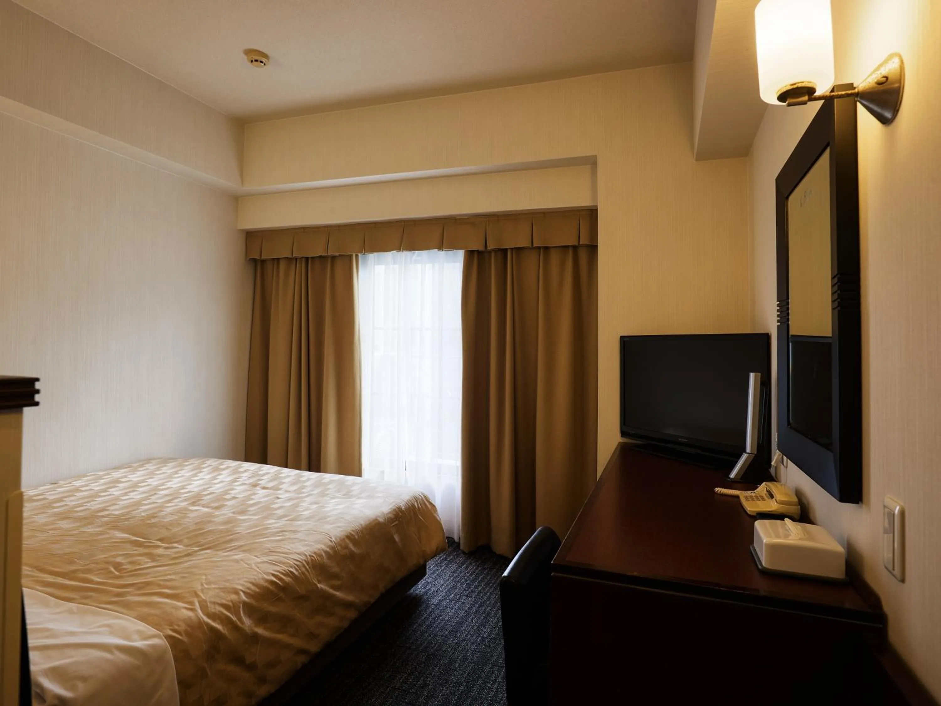 Photo of the whole room, Bed in Hotel Blion Naha