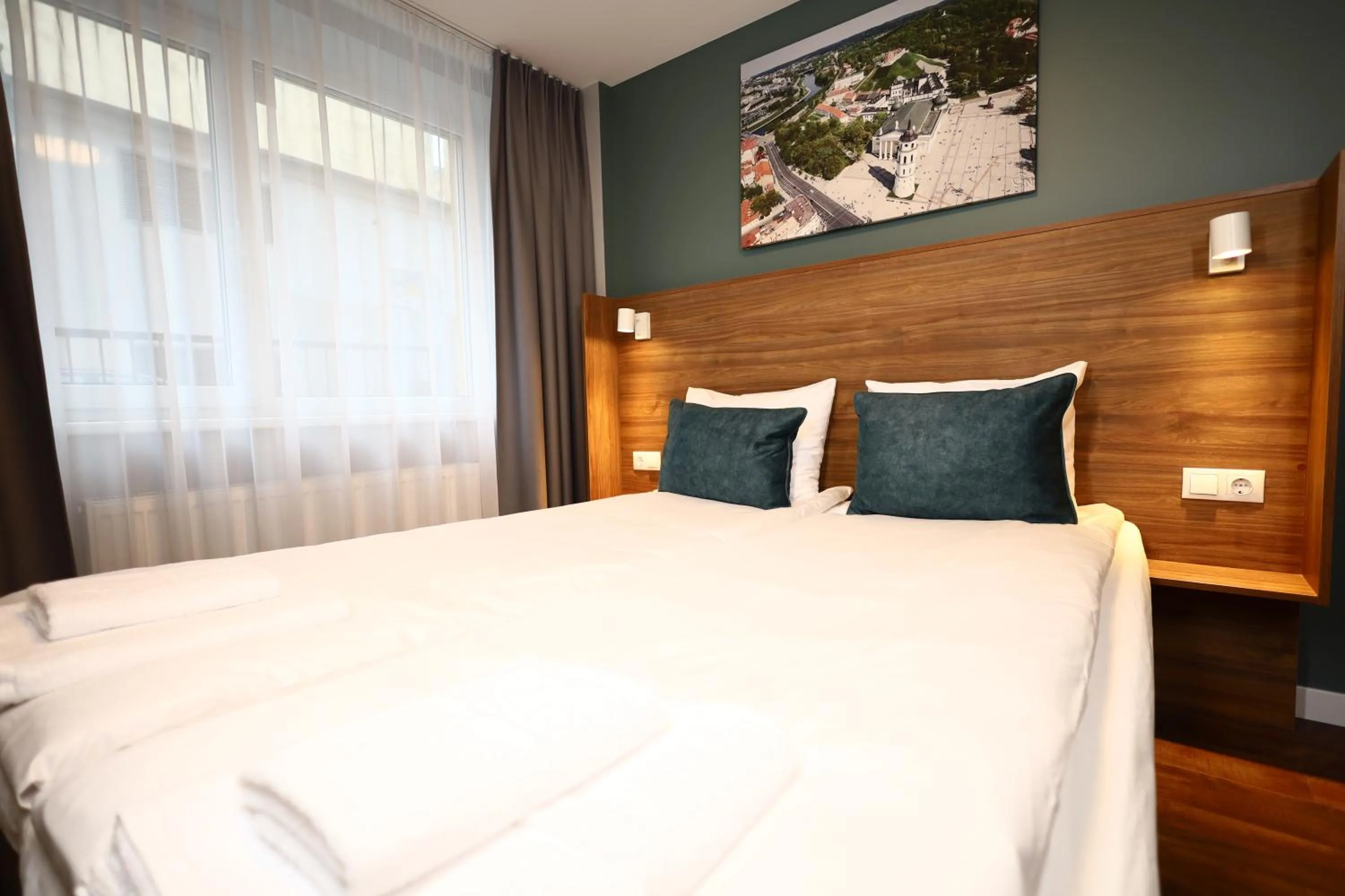 Bed in Stay Vilnius Hotel