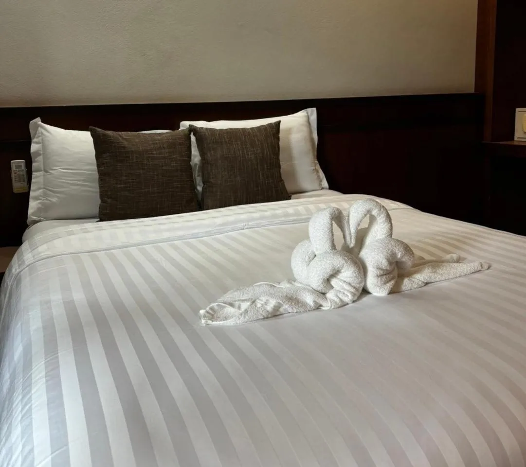 Bed in Rin Bay View Resort