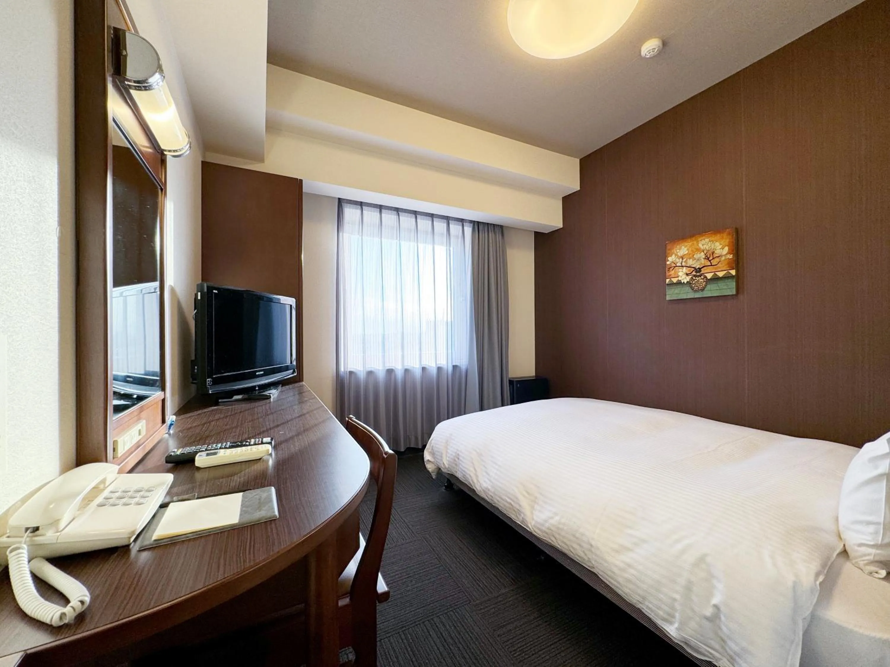 Photo of the whole room, Bed in Hotel Route-Inn Koriyama Minami
