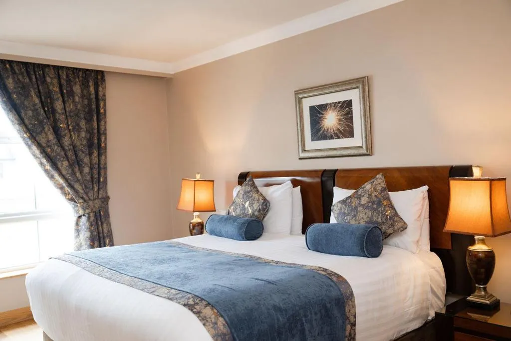 Bed in The Villa Rose Hotel & V-Spa