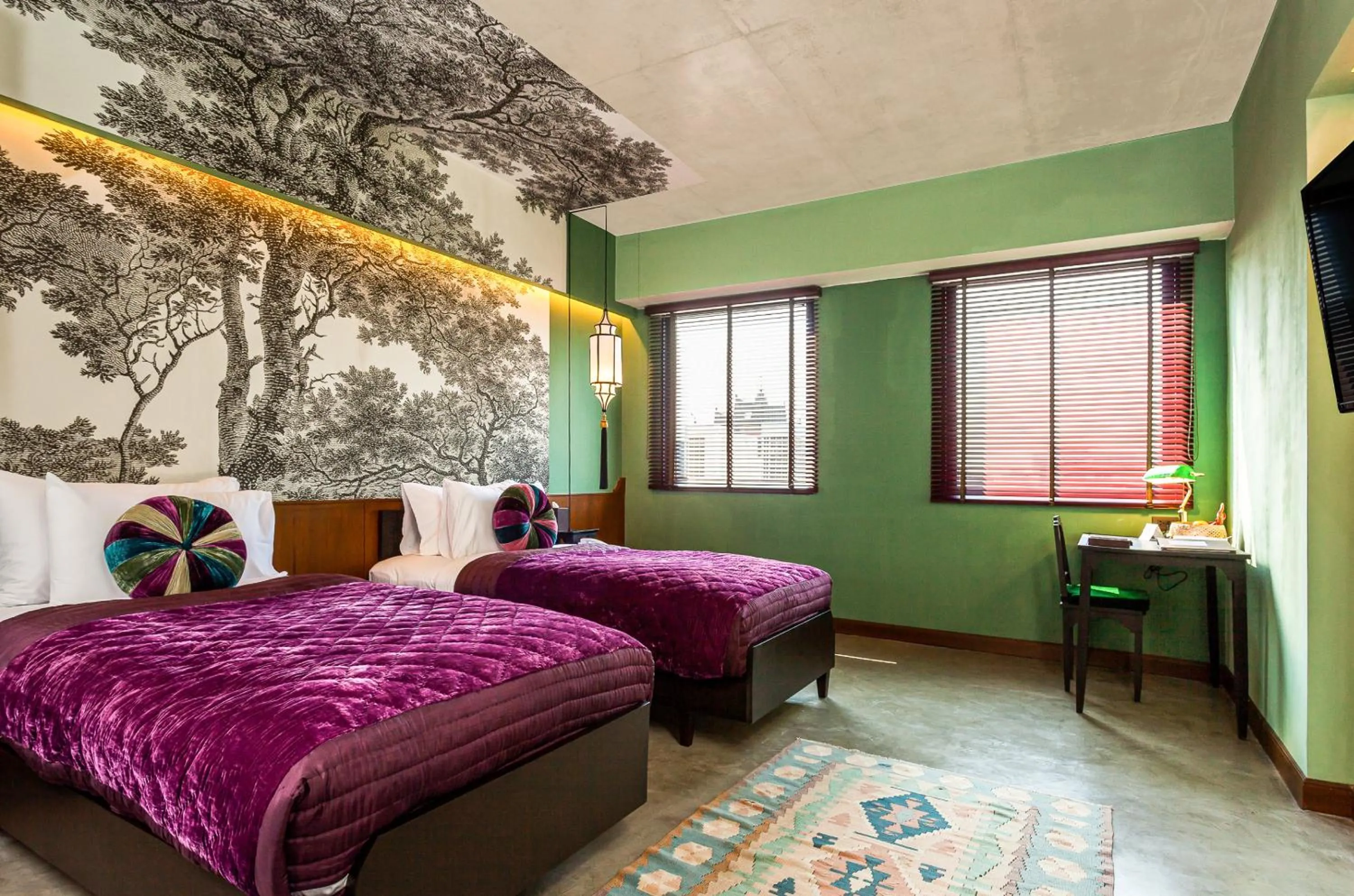 Bed in Lao Poet Hotel