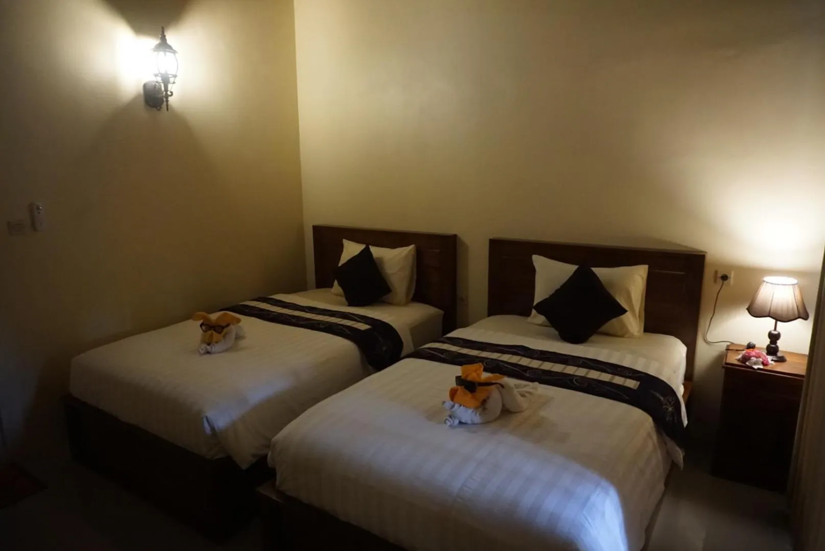 Bed in Kubu Artha Bungalow Nusa Penida