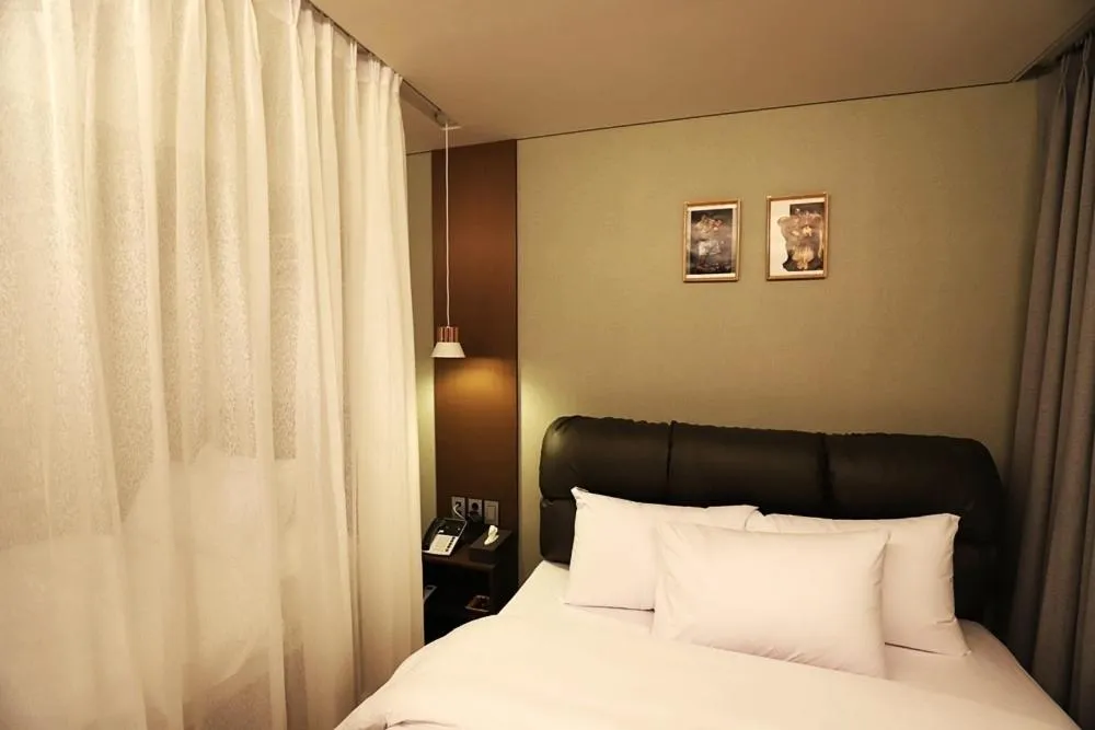 Bed in Namyangju Bukhangang dolcecasa hotel