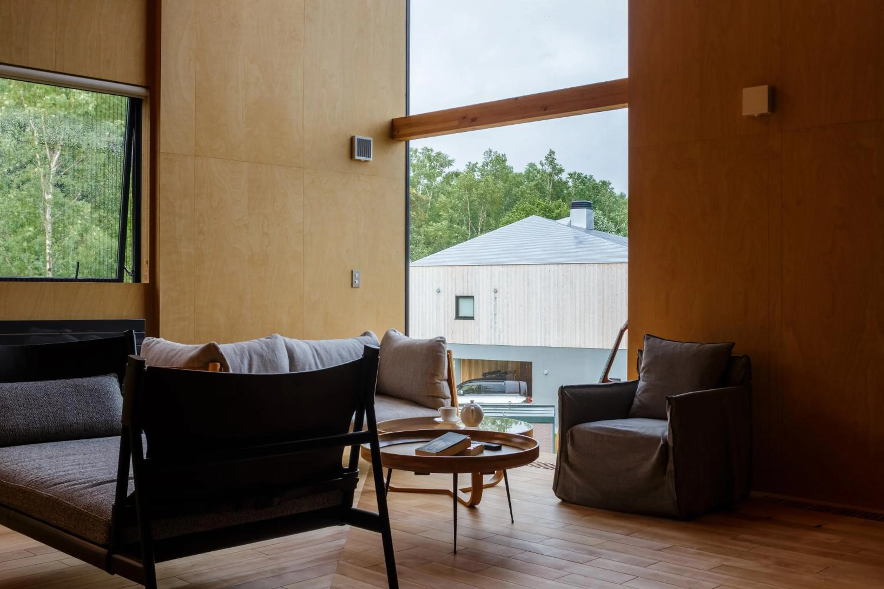 Living room in Foxwood E by H2 Life