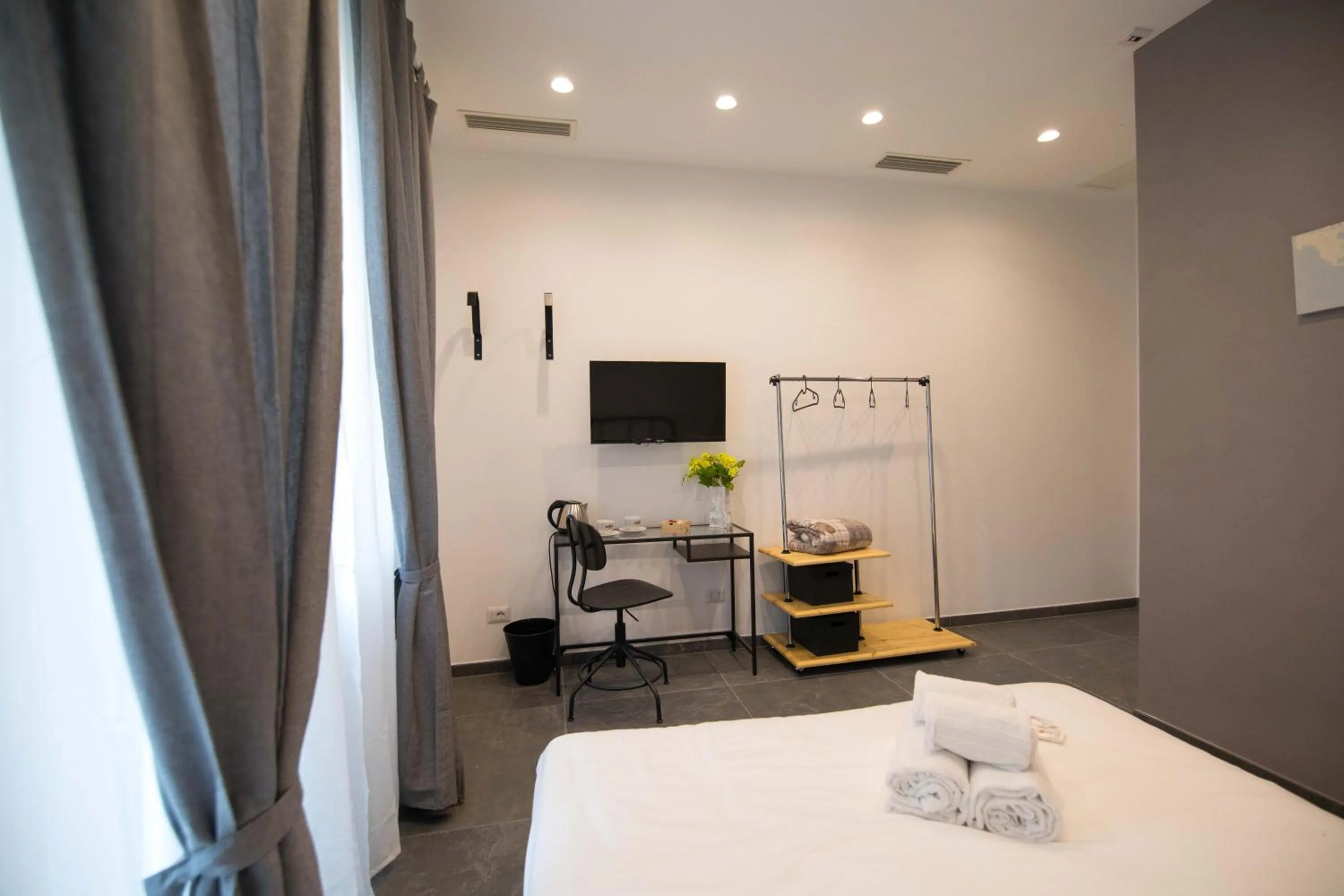 Photo of the whole room, Bed in Quattro Briganti