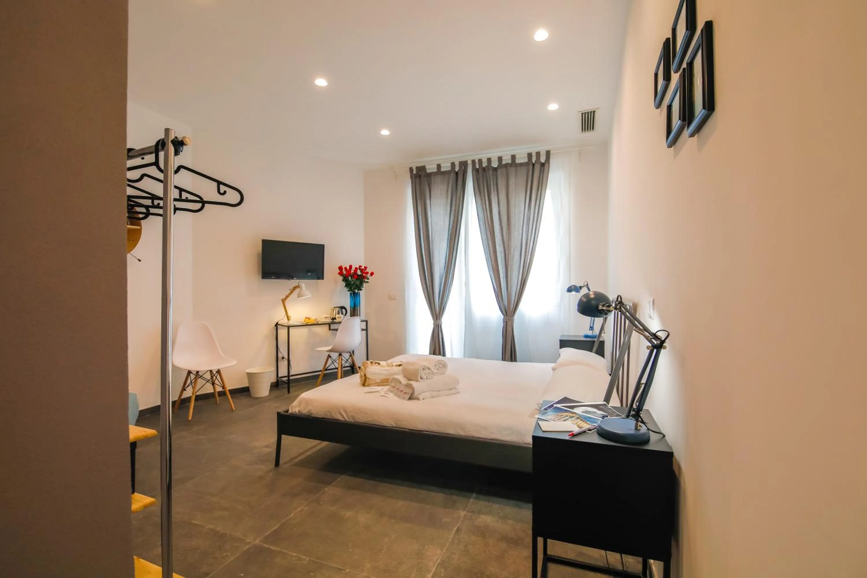 Photo of the whole room, Bed in Quattro Briganti