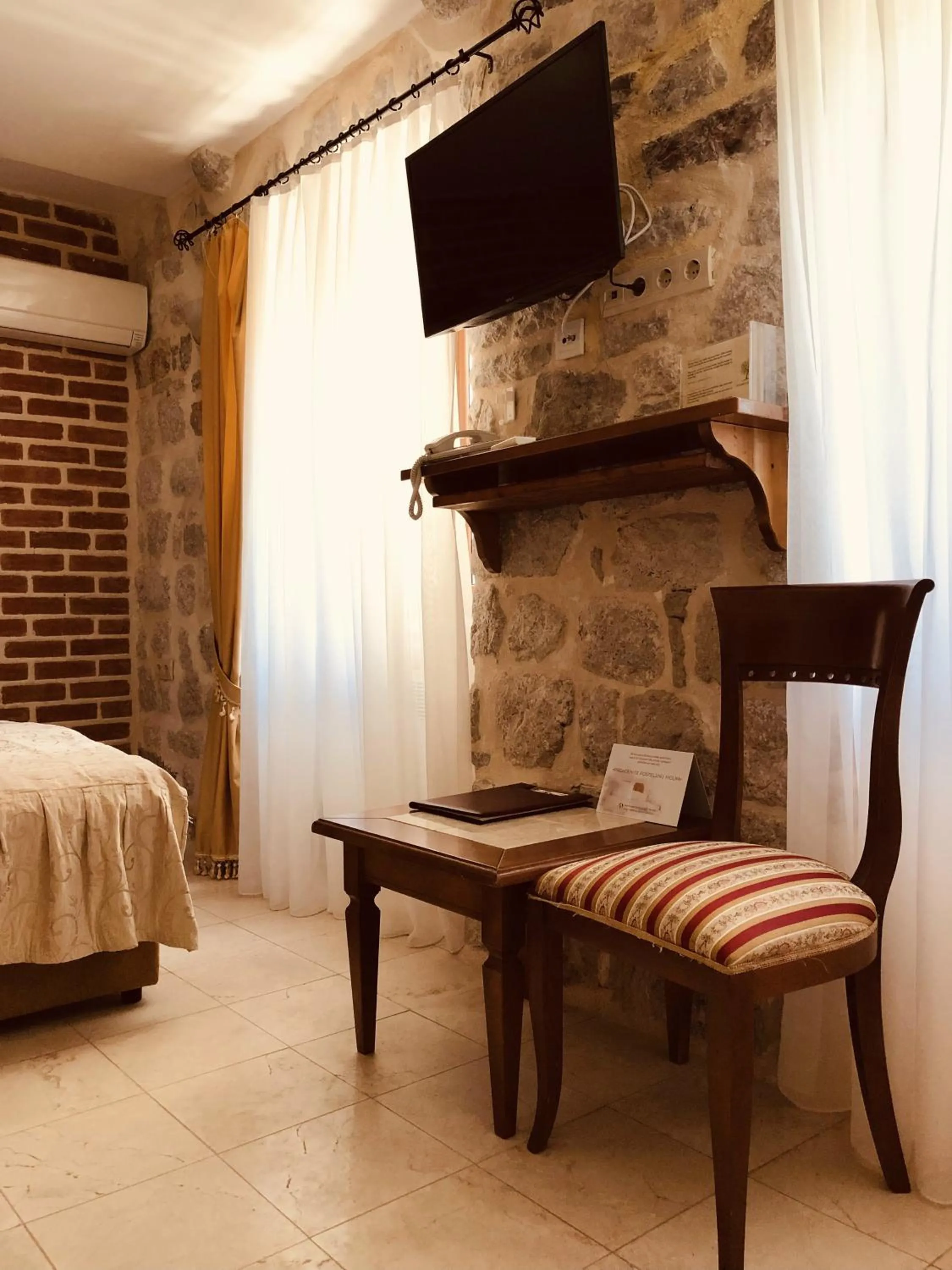 Seating area, Bed in Hotel Galathea