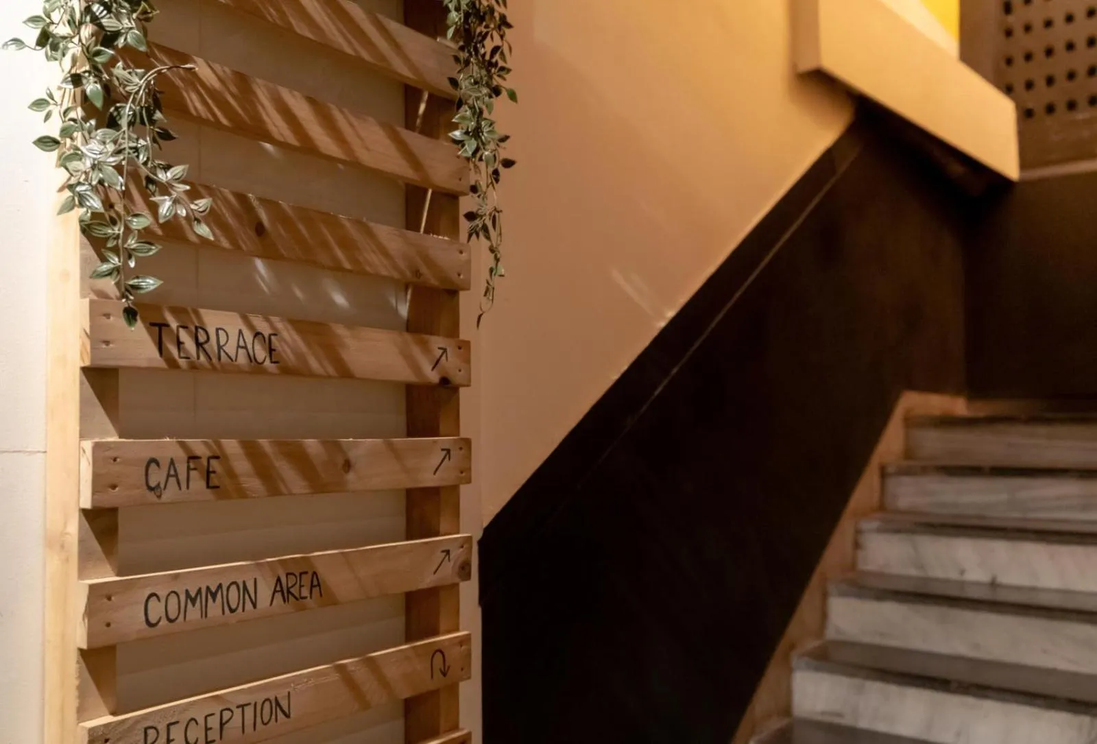 Text overlay in Locomo Hostel OG - Stay Work Eat