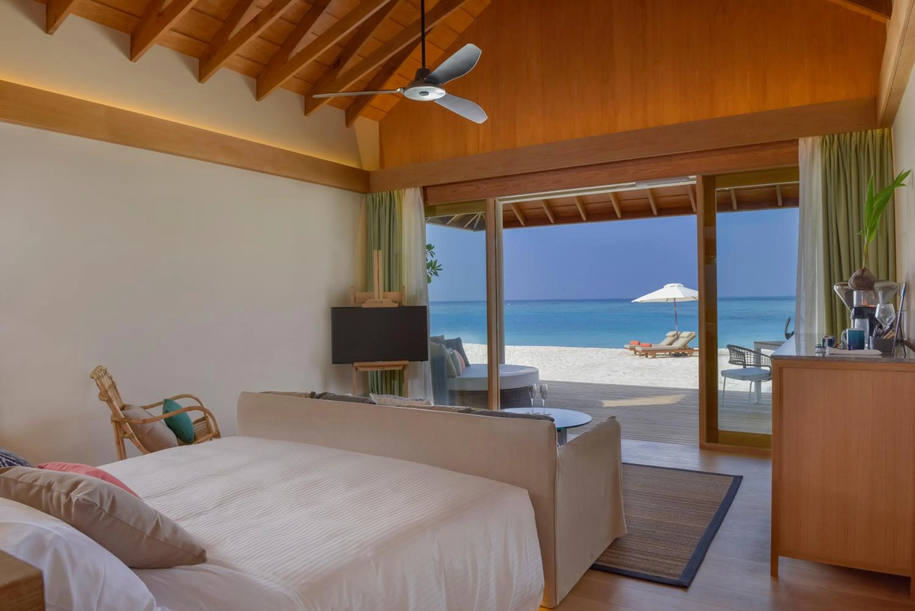 Bed in Emerald Faarufushi Resort & Spa - Deluxe All Inclusive