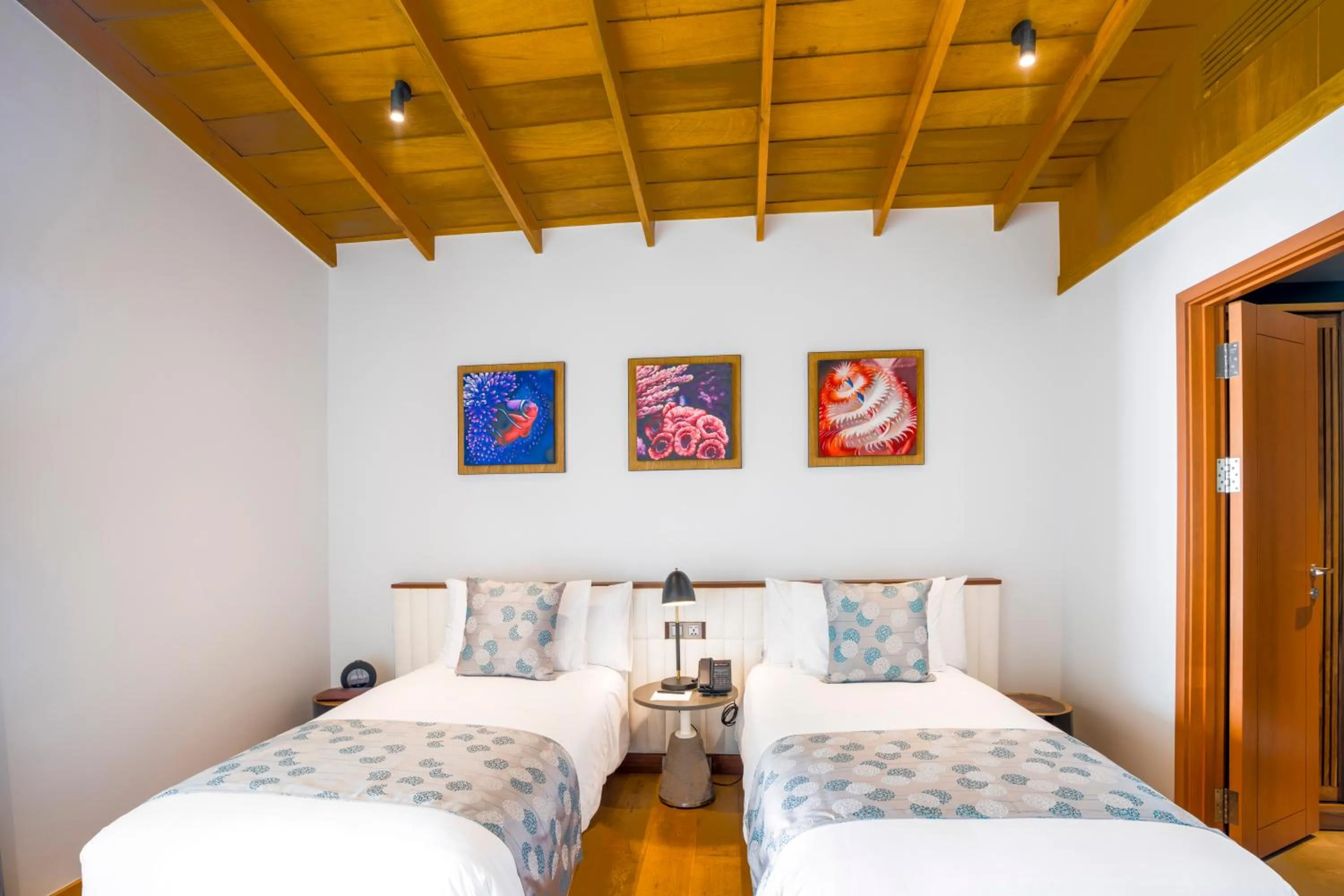 Bed in Emerald Faarufushi Resort & Spa - Deluxe All Inclusive