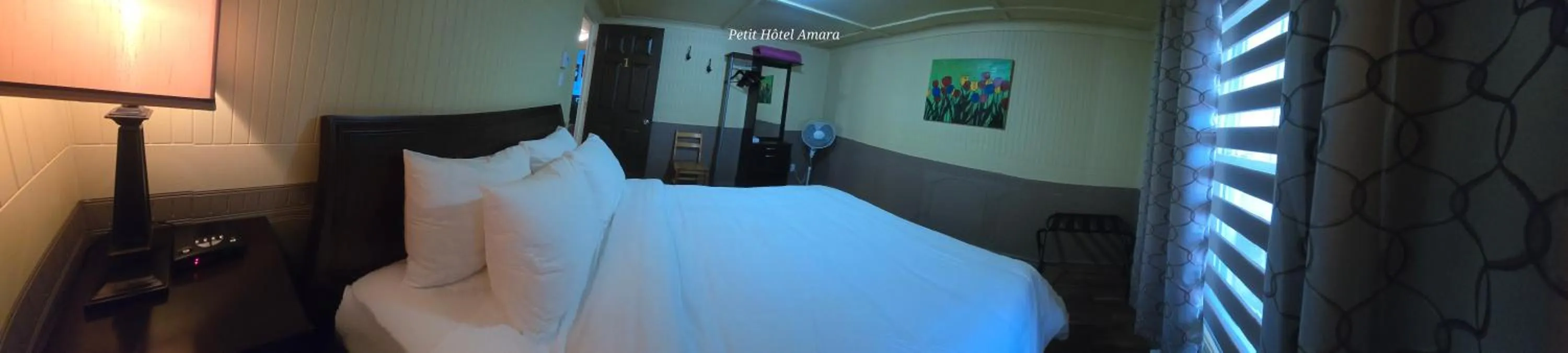 Bed in Petit Hôtel Amara