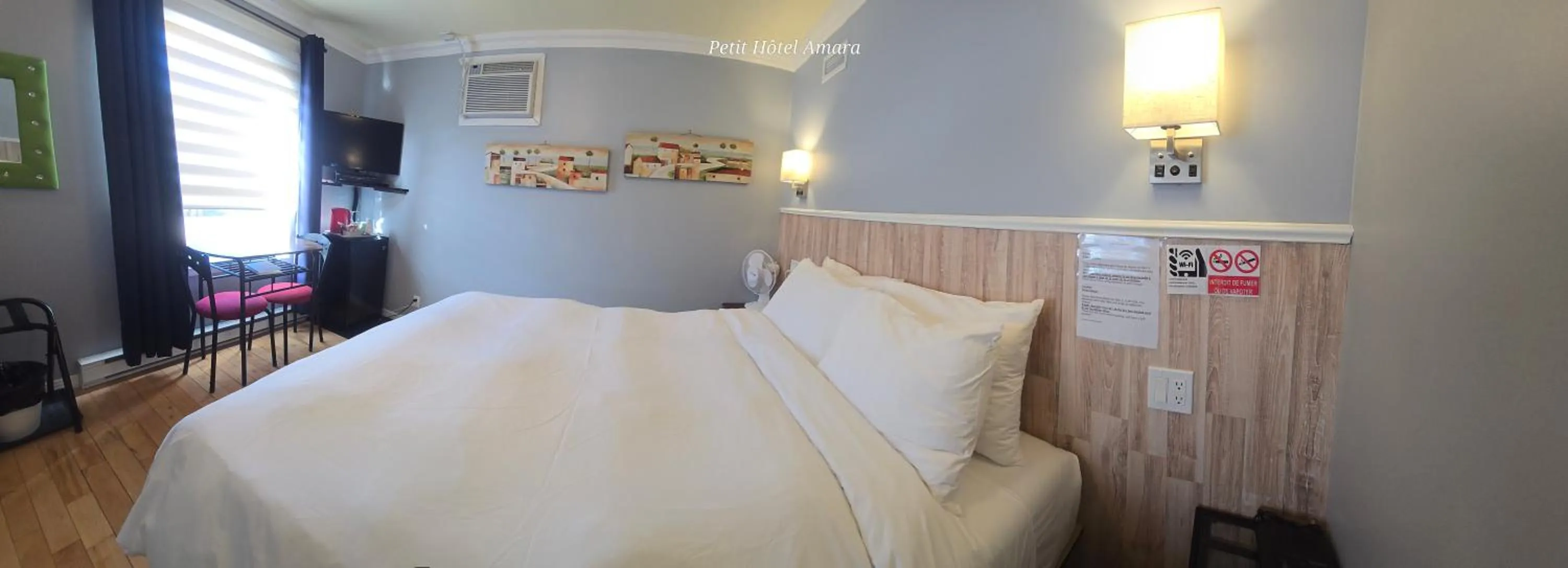 Bed in Petit Hôtel Amara