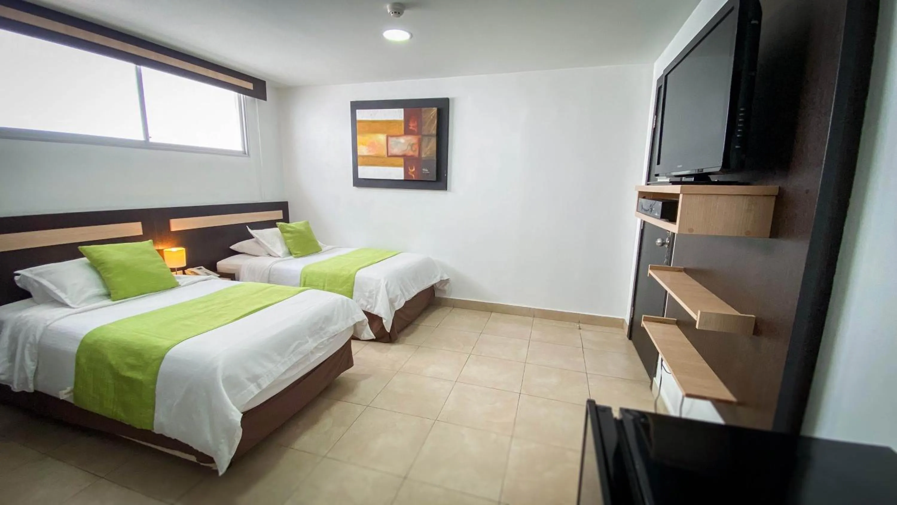 Bed in Hotel MC Suites - Confort cerca del Aeropuerto