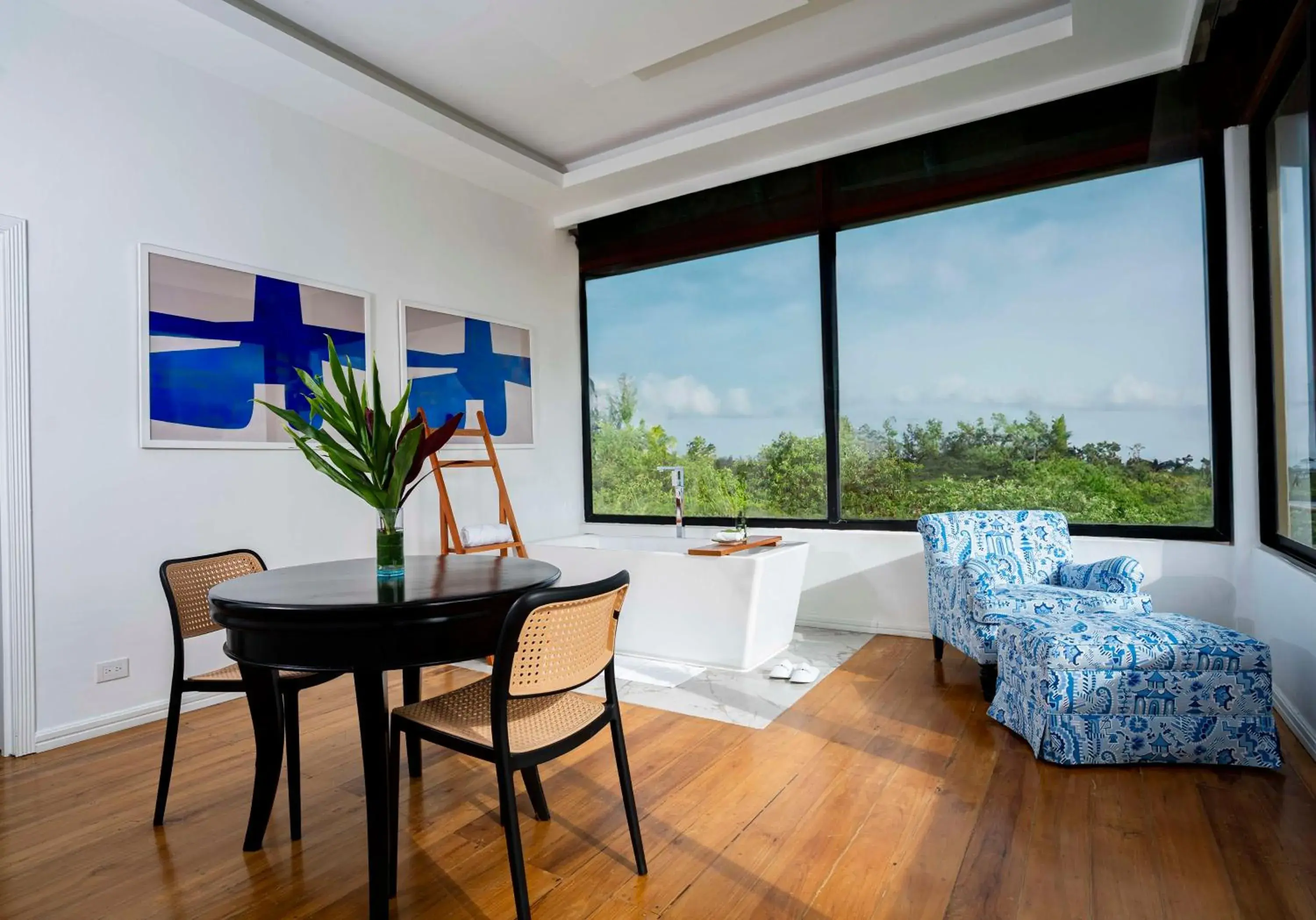 Living room, Bed in Royal Palm Galapagos, Curio Collection Hotel by Hilton Living room, Bed in Royal Palm Galapagos, Curio Collection Hotel by Hilton