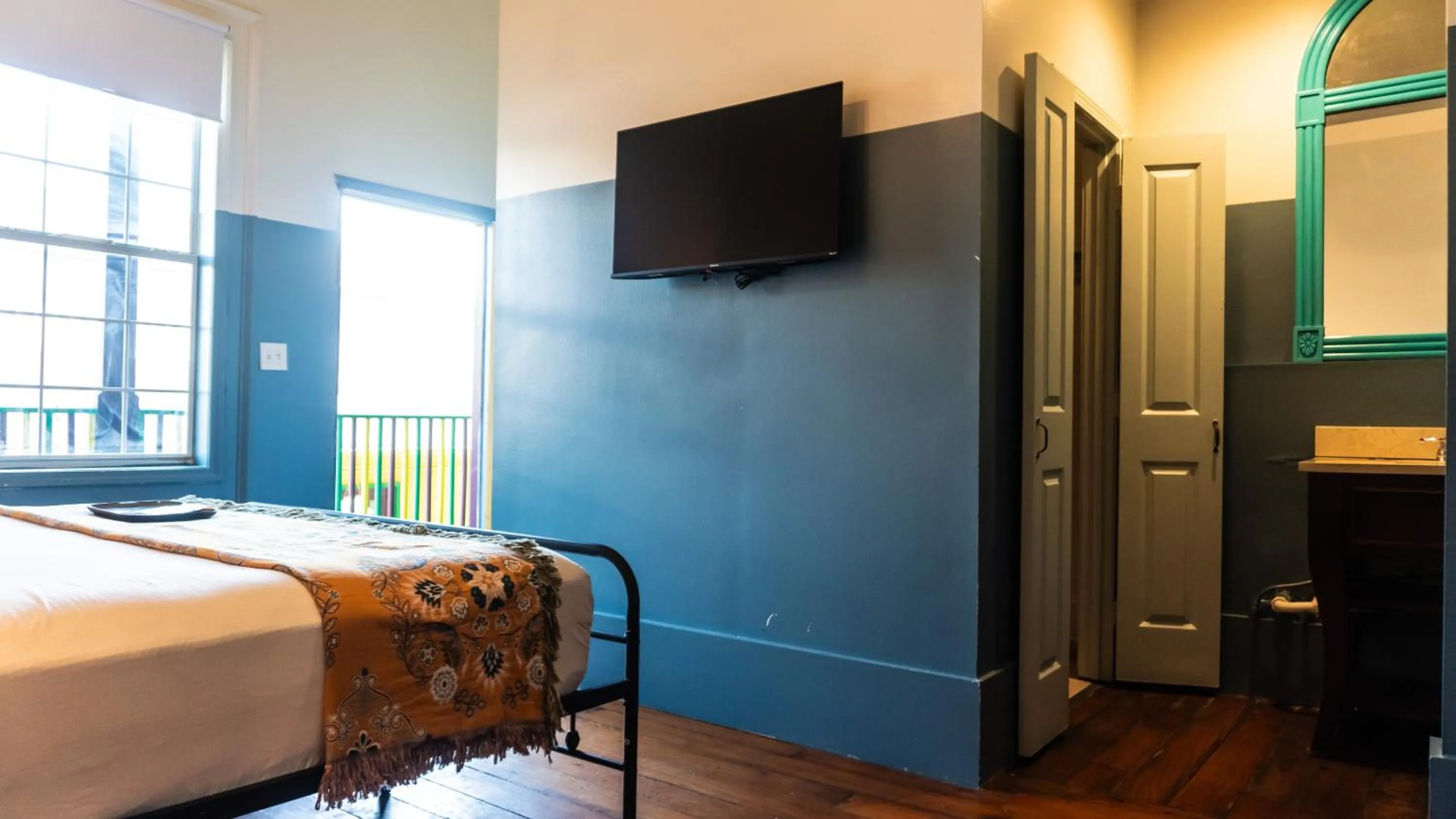 Bed in Historic Mardi Gras Inn