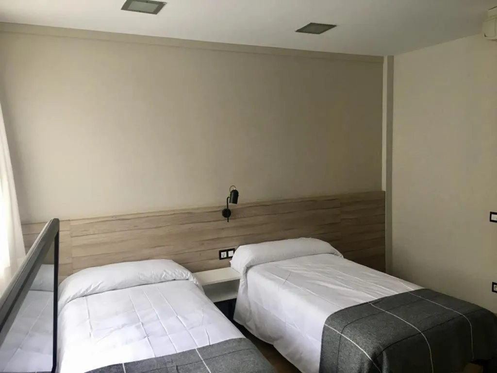 Bed in Hotel Torres Manlleu