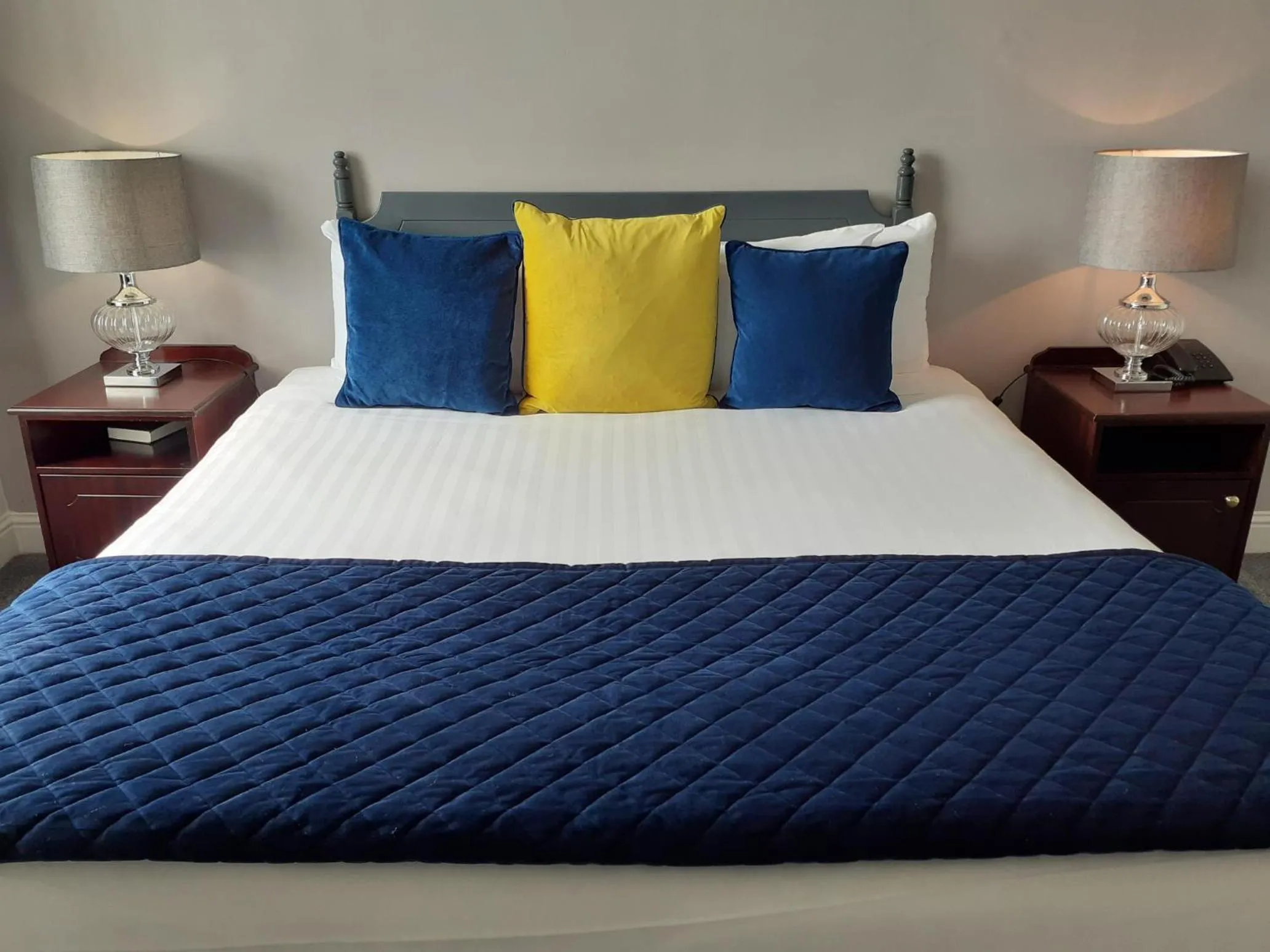 Bed in Commodore Hotel