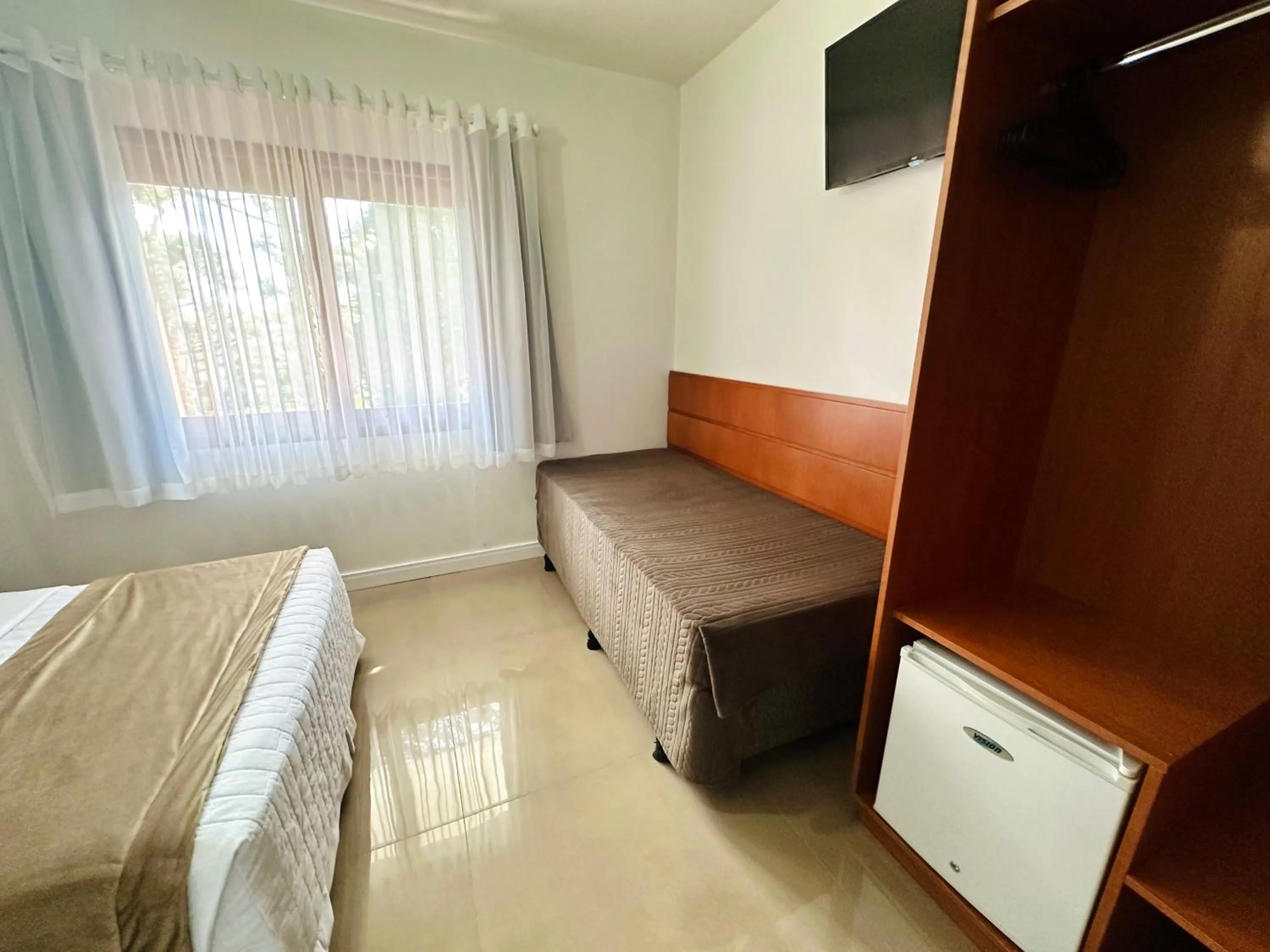 Bed in Pousada do Lago - Gramado