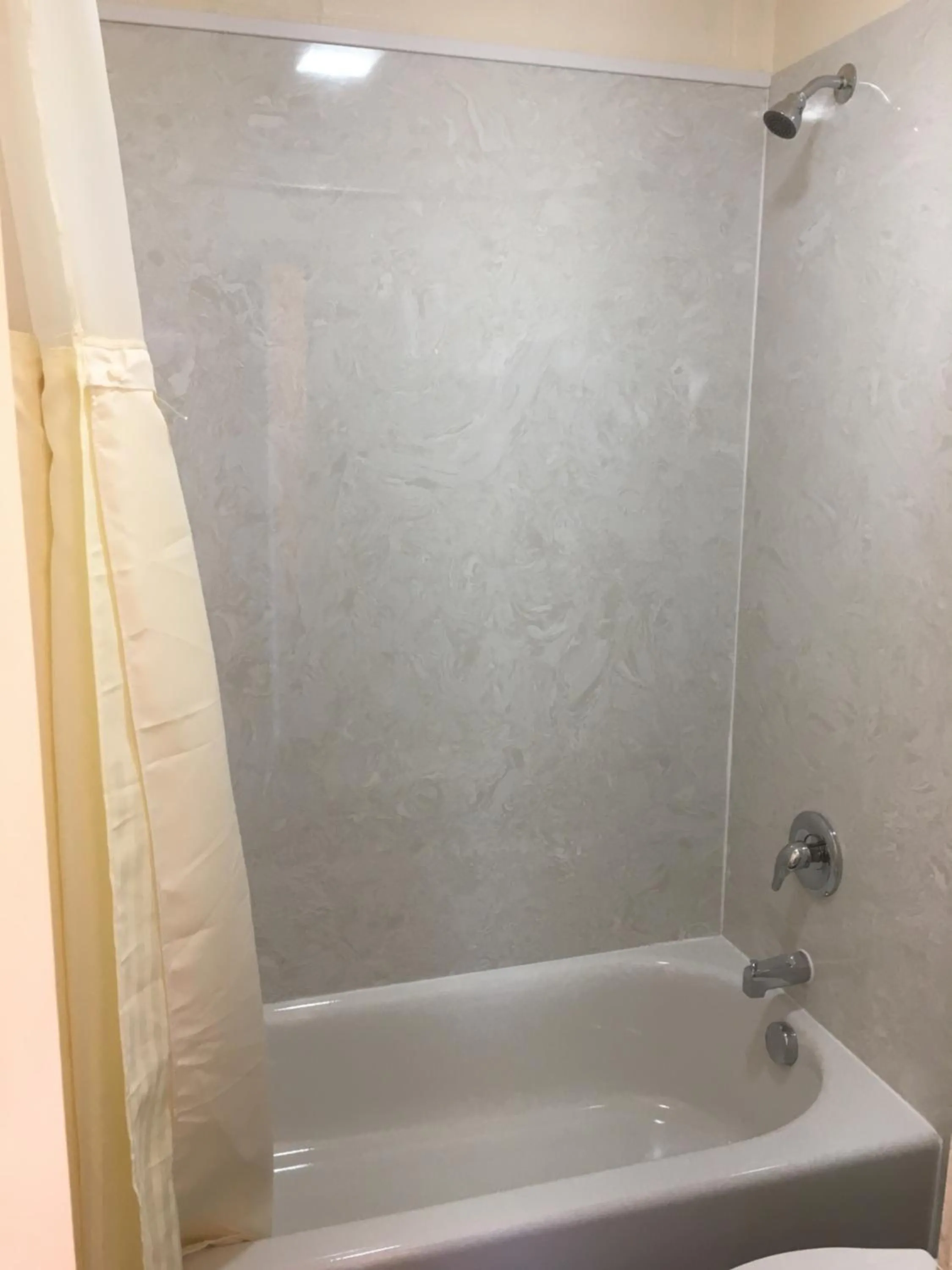 Shower in Budget Inn Motel