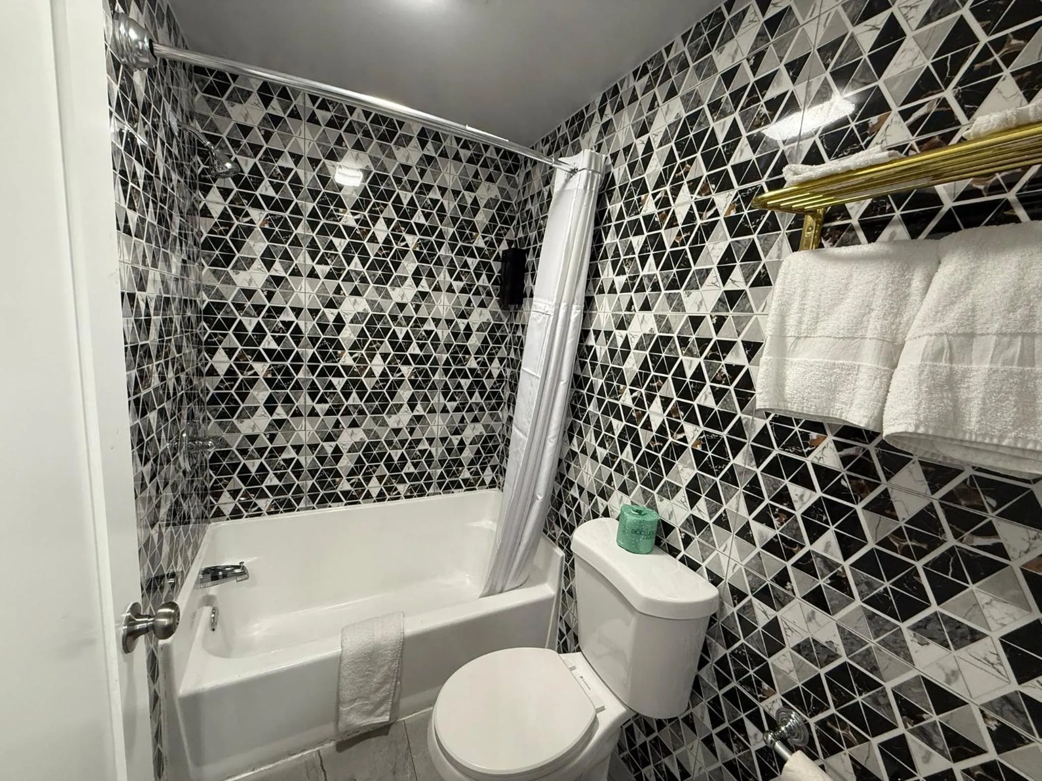Toilet in Beauty Rest Hotel