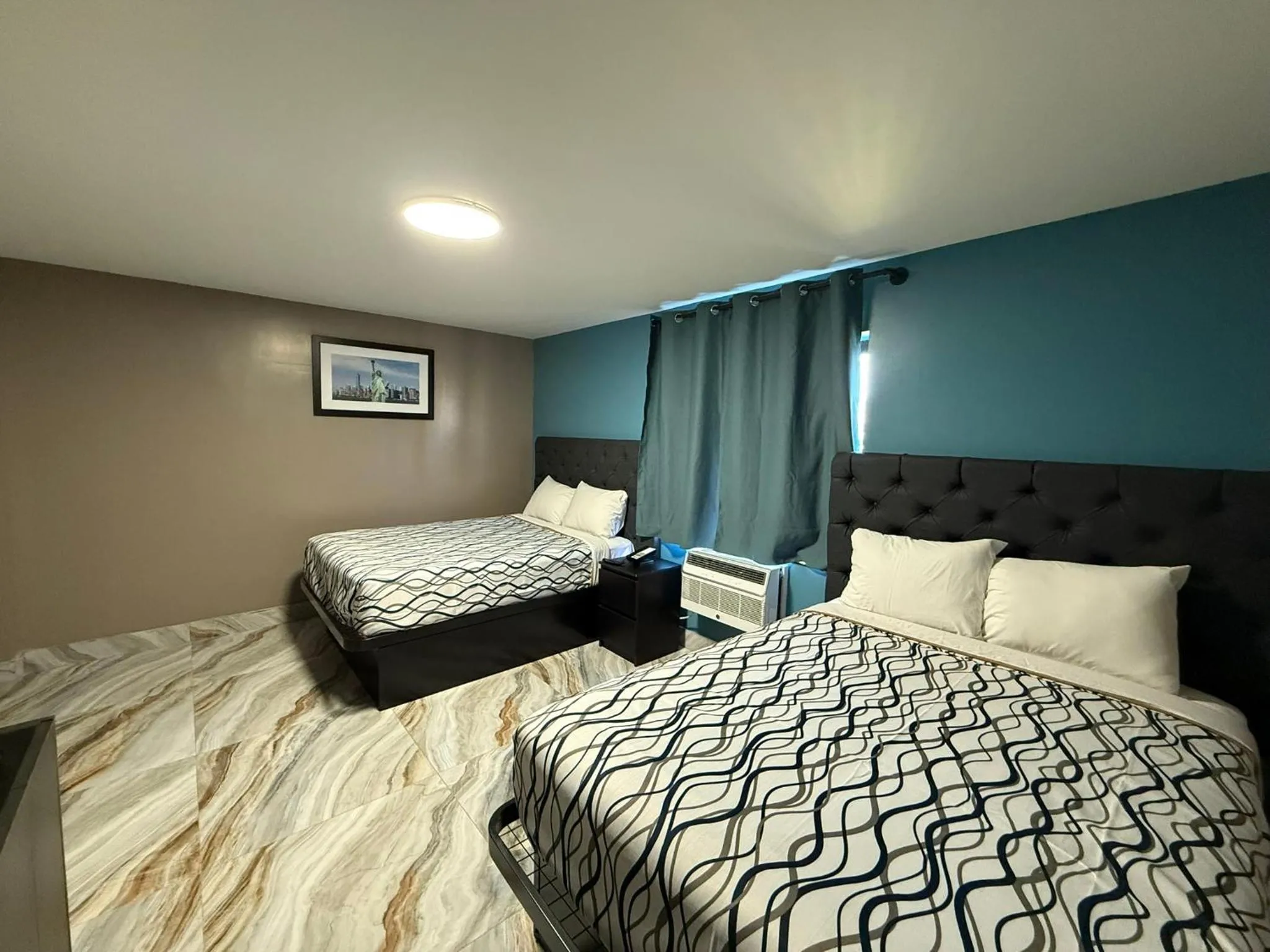 Bed in Beauty Rest Hotel