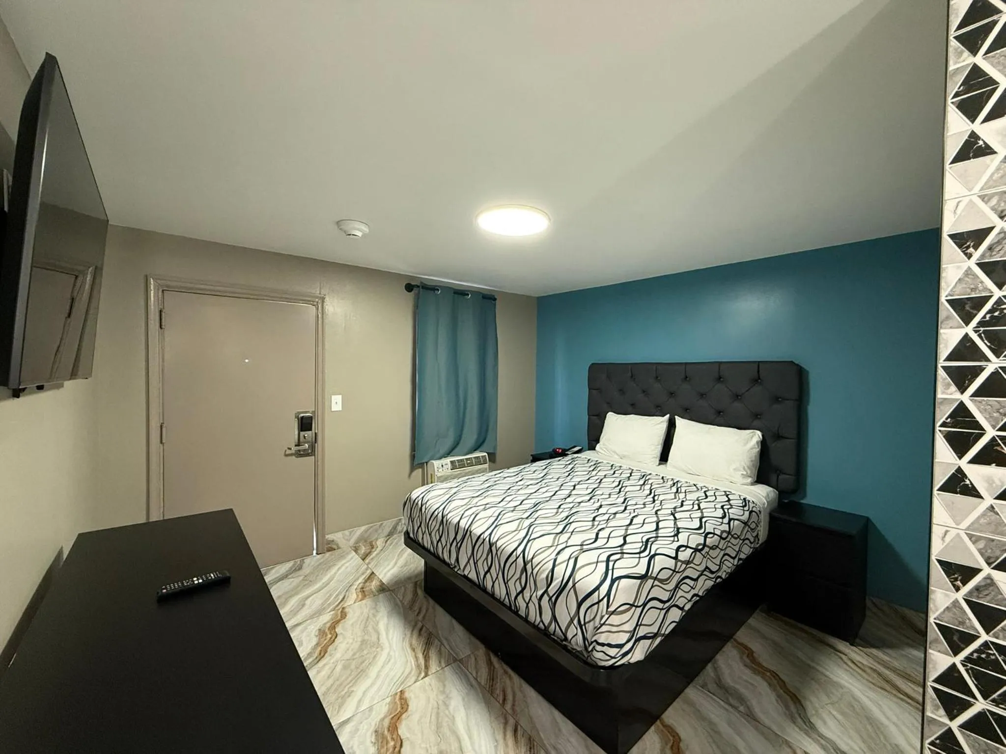 Bed in Beauty Rest Hotel