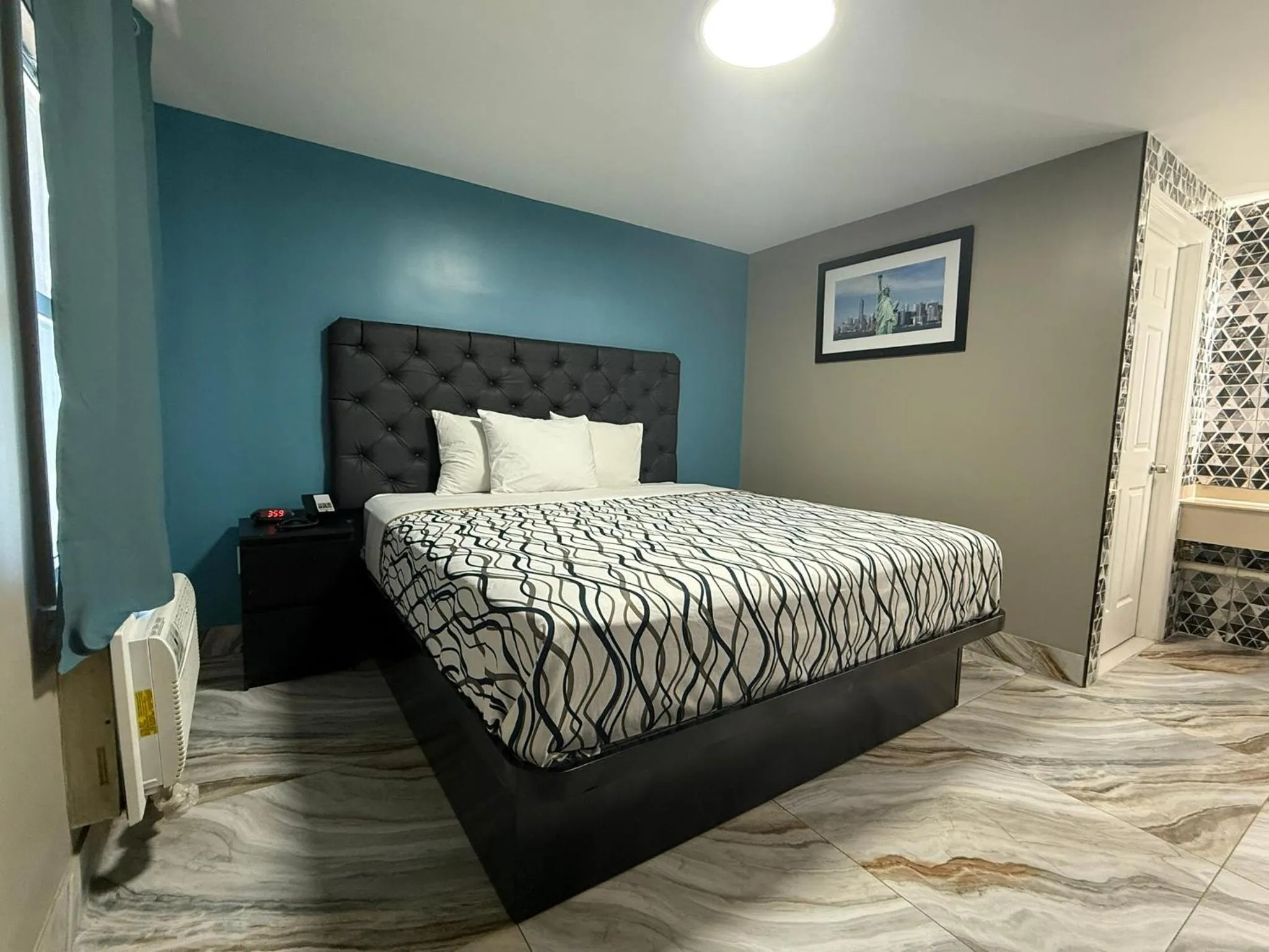 Bed in Beauty Rest Hotel