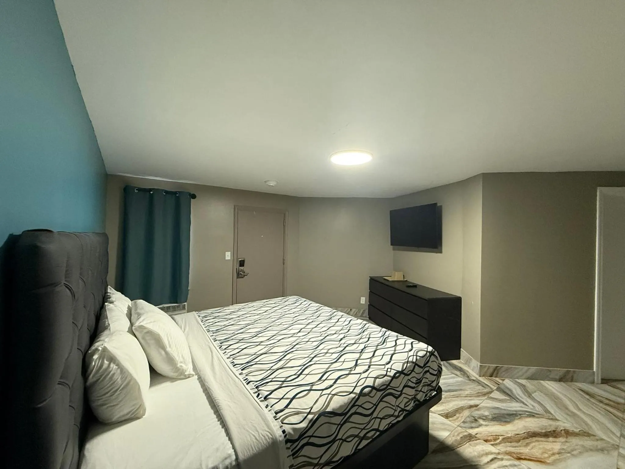 Bed in Beauty Rest Hotel