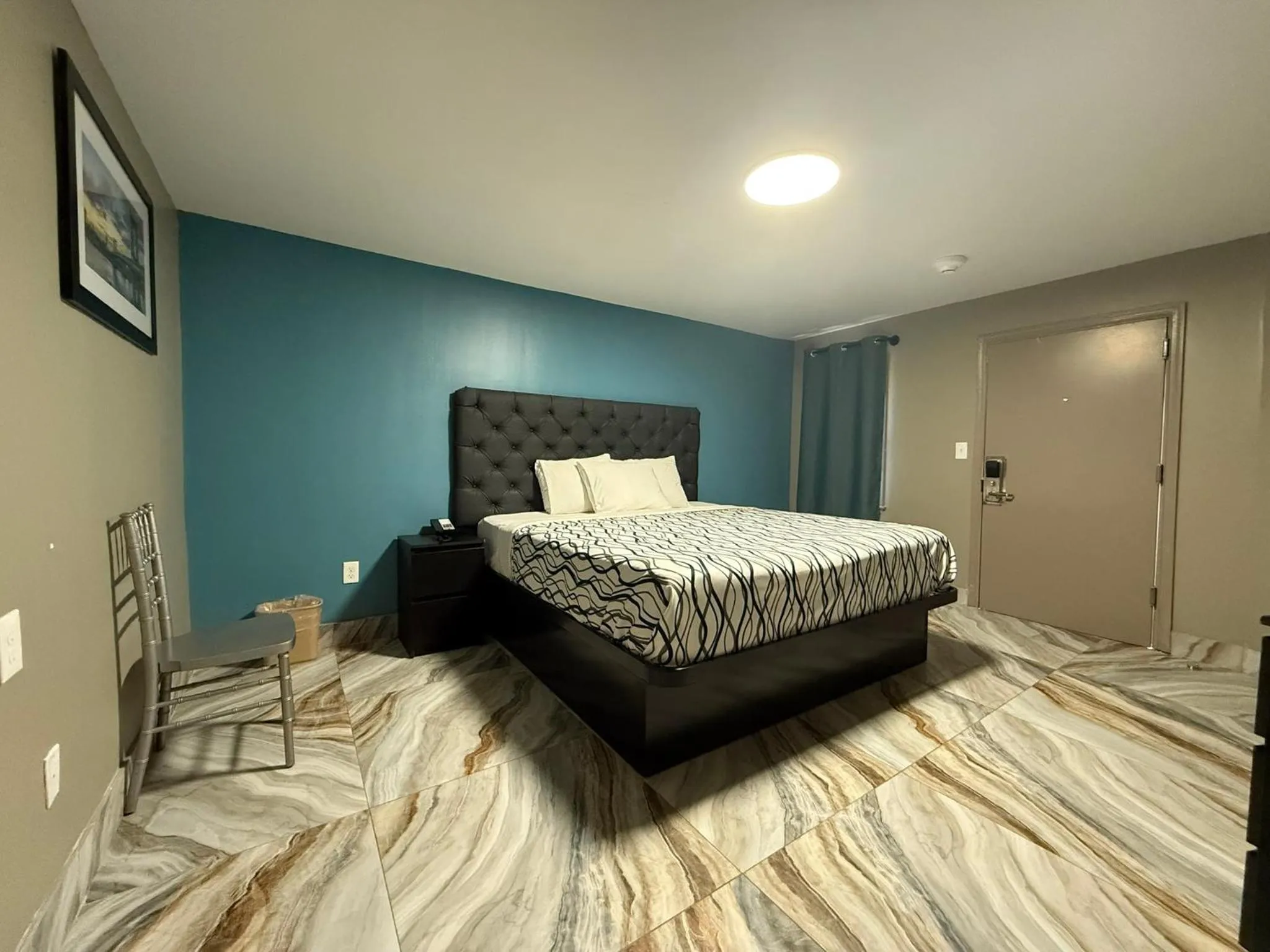 Bed in Beauty Rest Hotel