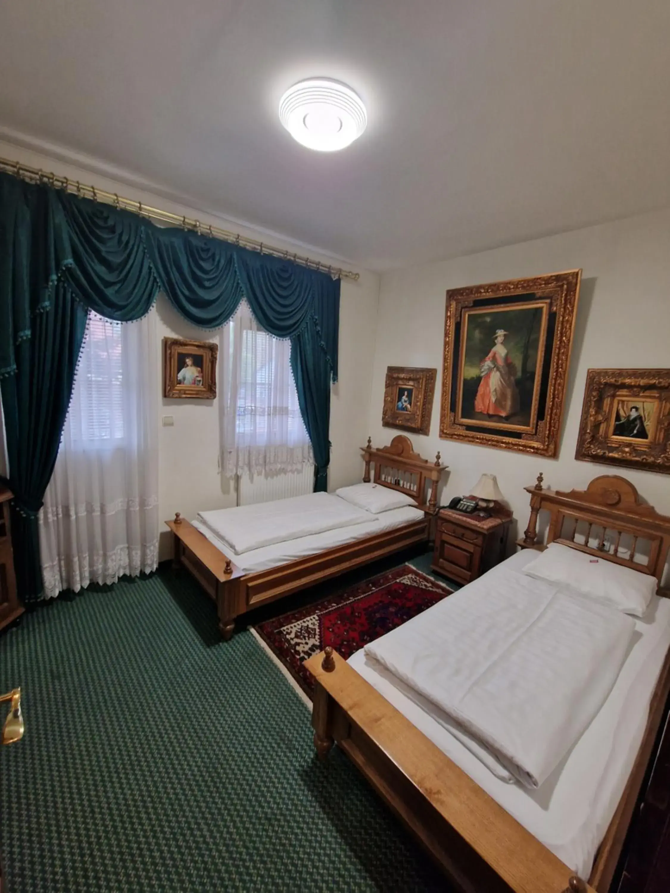 Twin Room with Balcony - single occupancy in Hotel Razgorsek Twin Room with Balcony - single occupancy in Hotel Razgorsek
