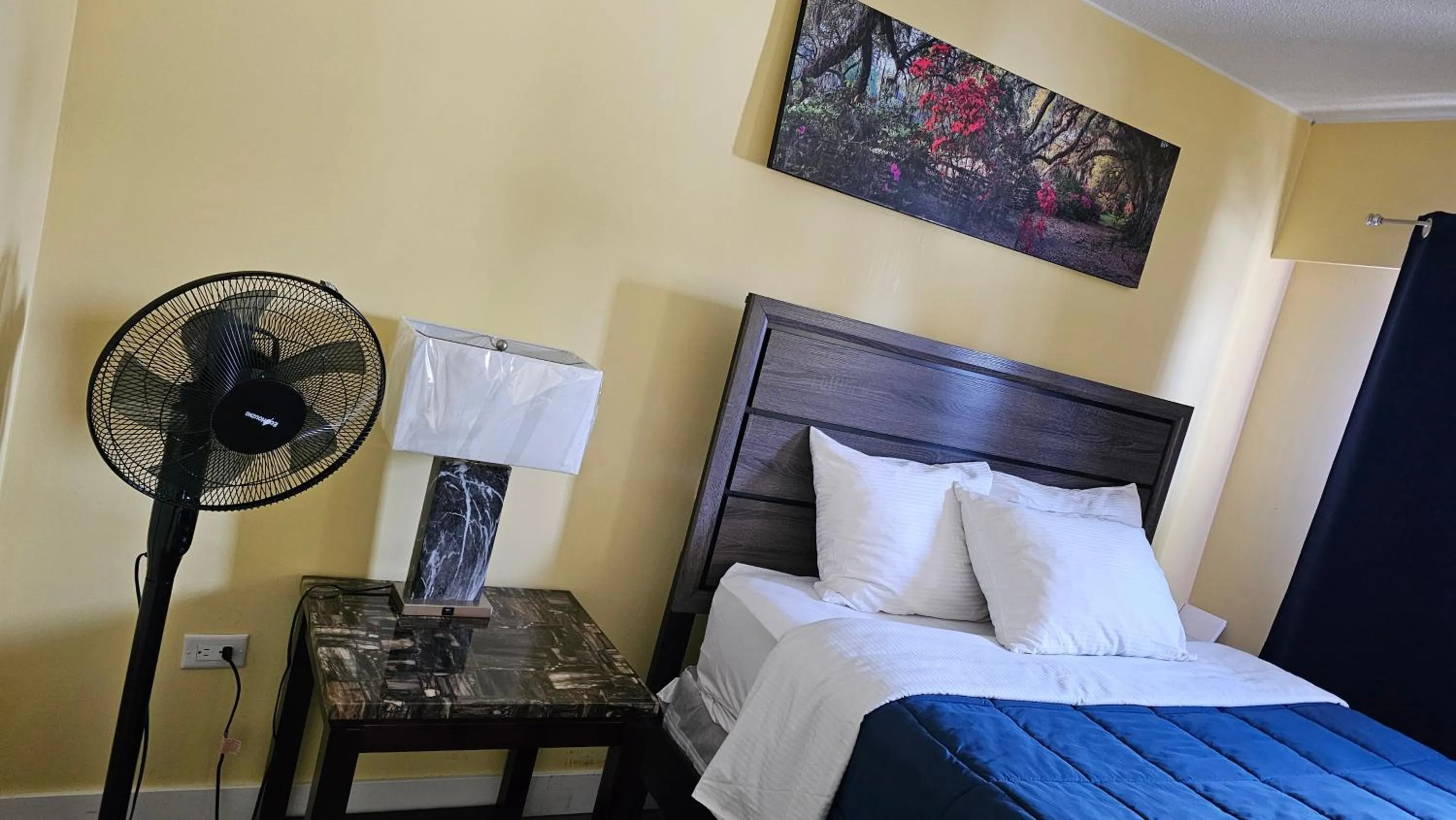 Bed in Port-O-Call Inn