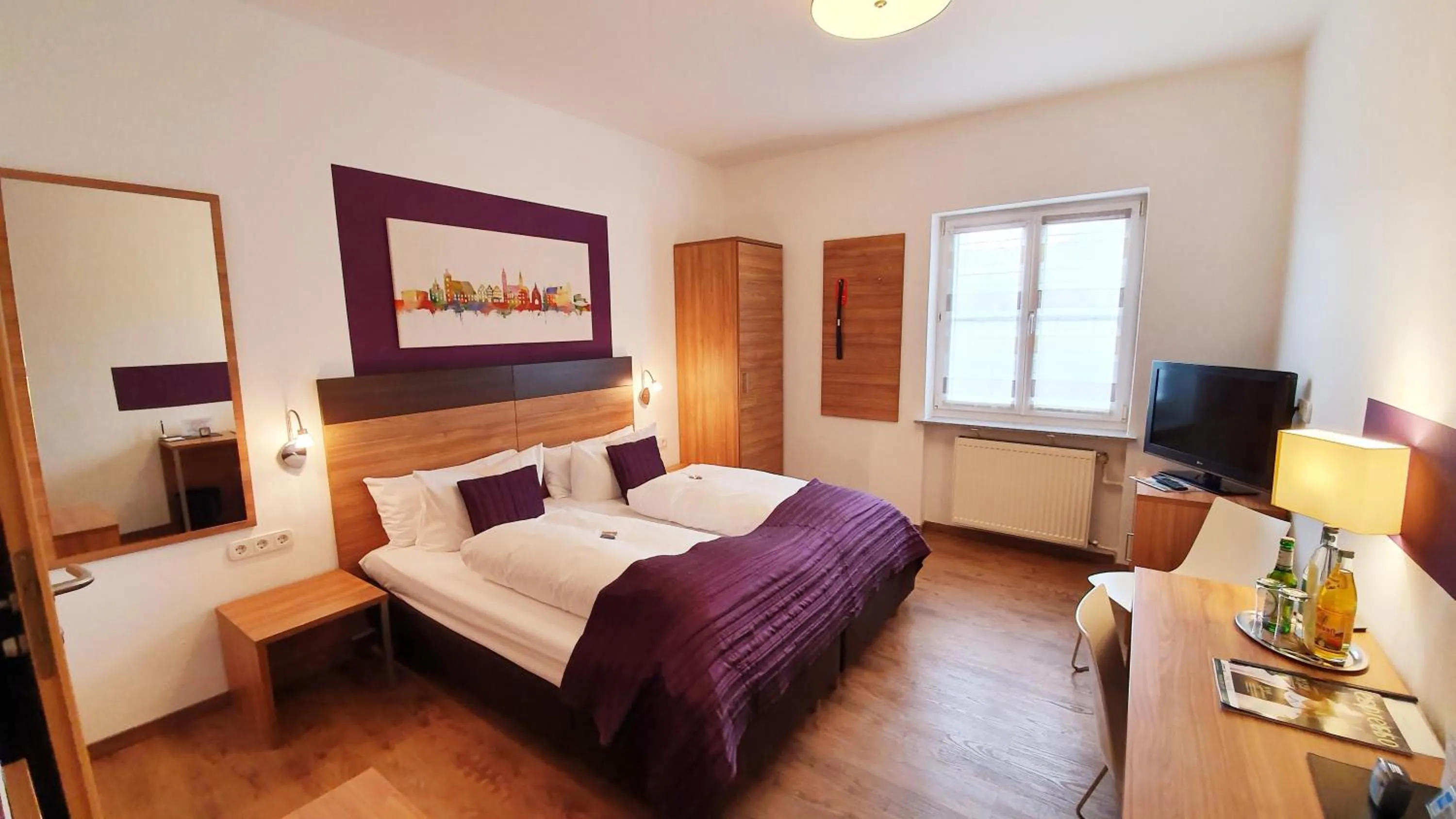 Bed in Hotel Hecht Garni