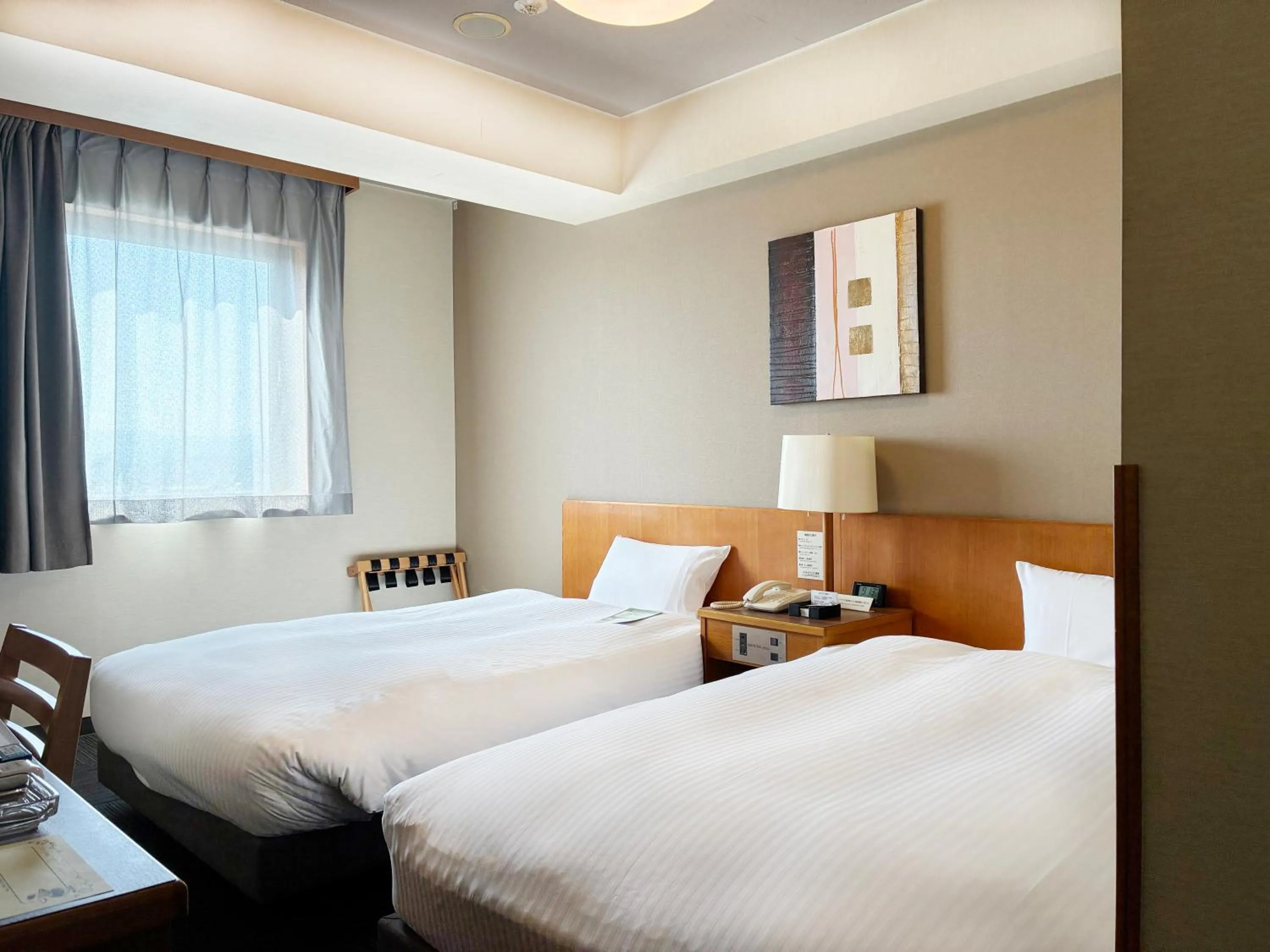 Photo of the whole room, Bed in Hotel Route-Inn Nagaizumi Numazu Inter 1