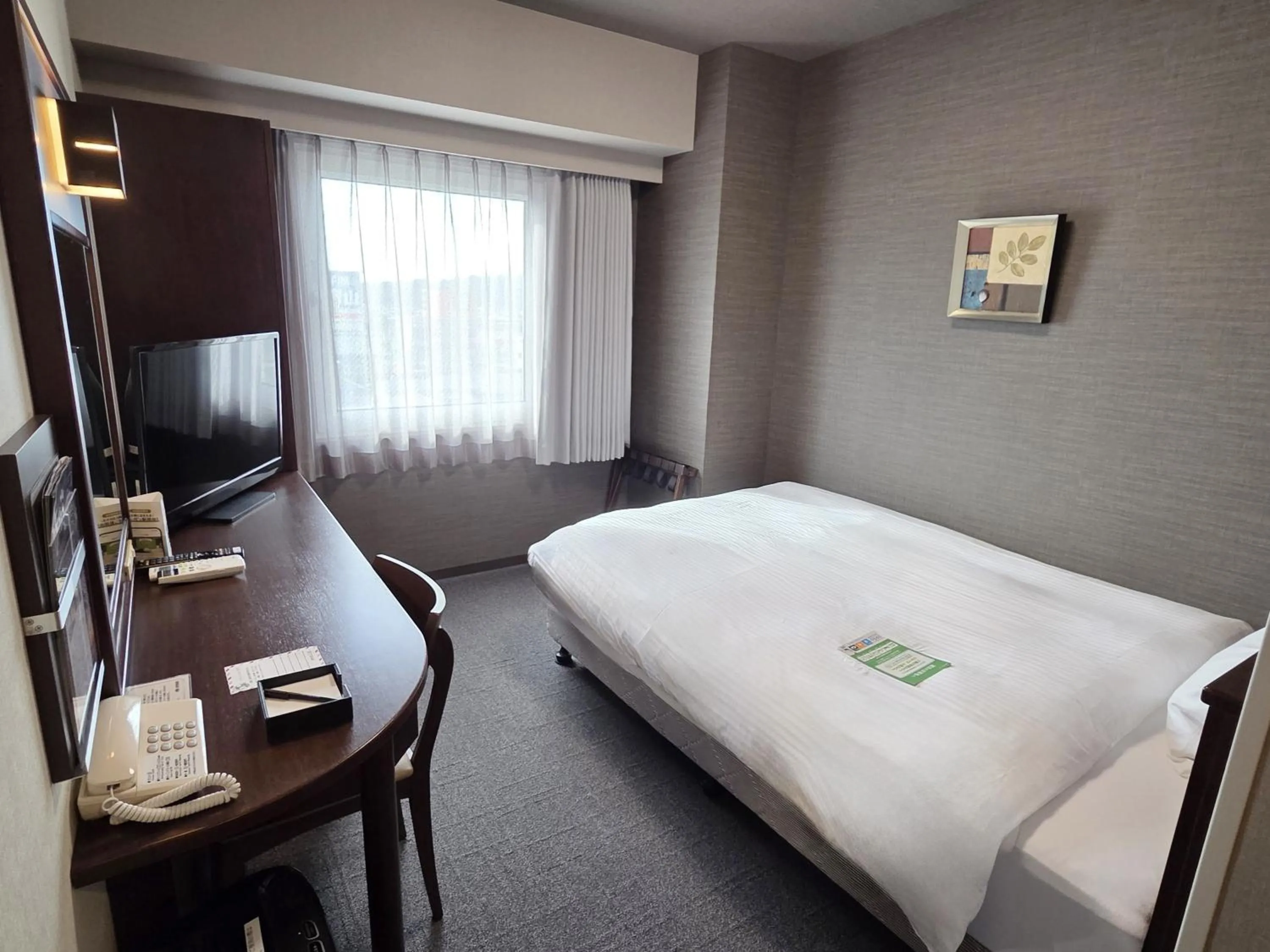 Photo of the whole room, Bed in Hotel Route-Inn Odate Eki Minami