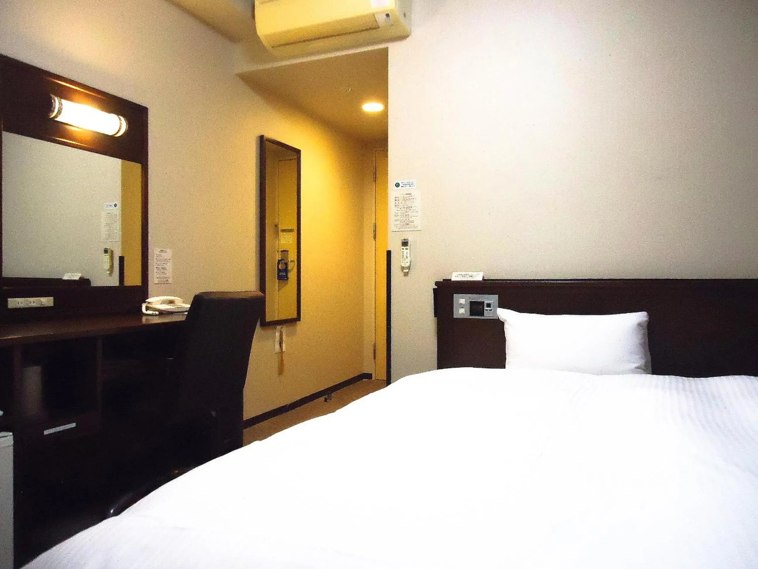 Photo of the whole room, Bed in Hotel Route-Inn Odate Eki Minami Photo of the whole room, Bed in Hotel Route-Inn Odate Eki Minami