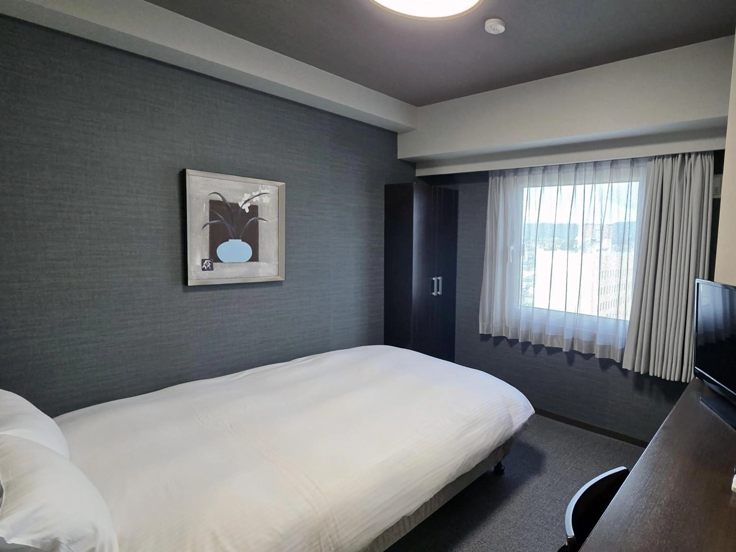 Photo of the whole room, Bed in Hotel Route-Inn Odate Eki Minami