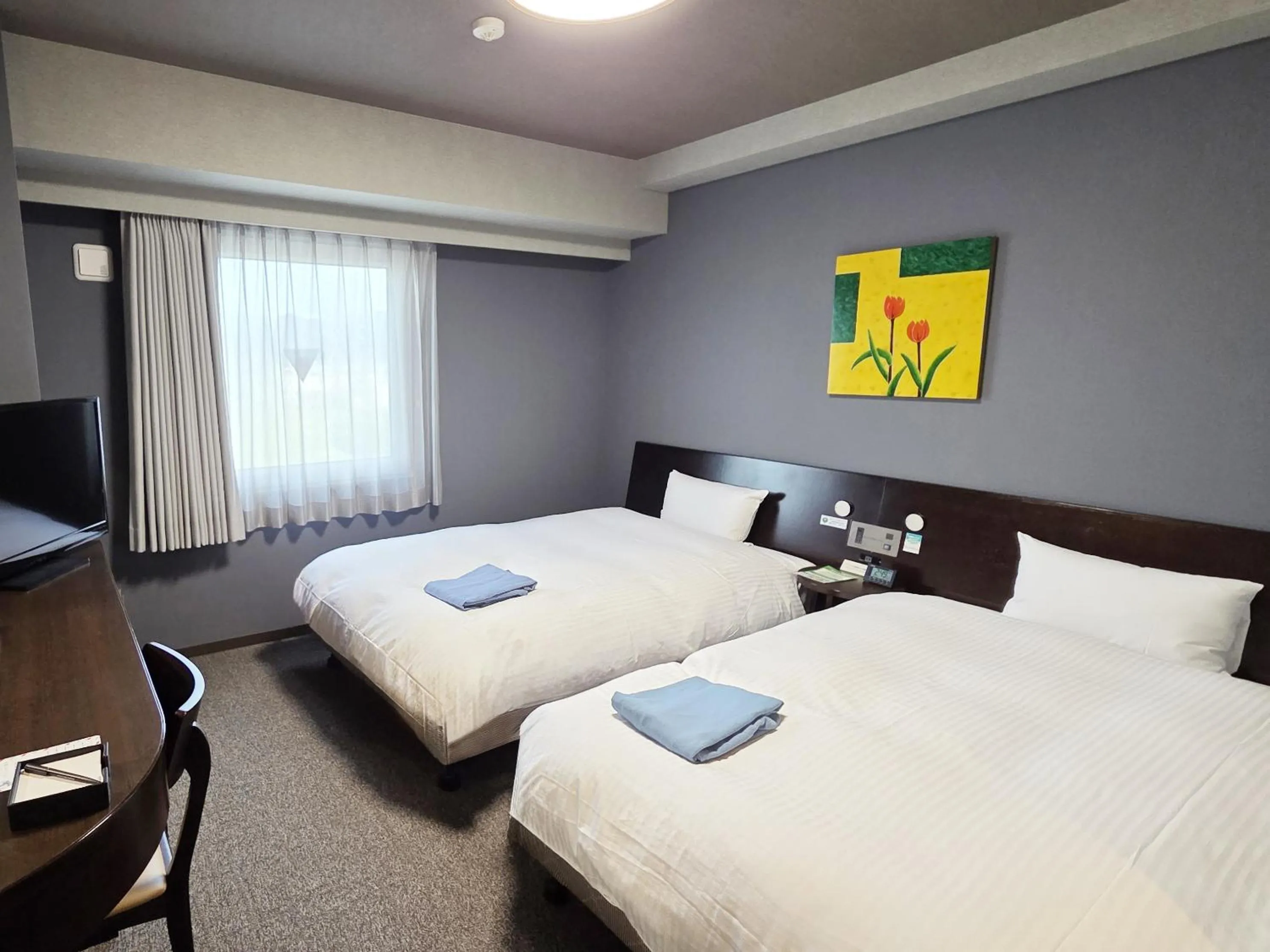 Photo of the whole room, Bed in Hotel Route-Inn Odate Eki Minami