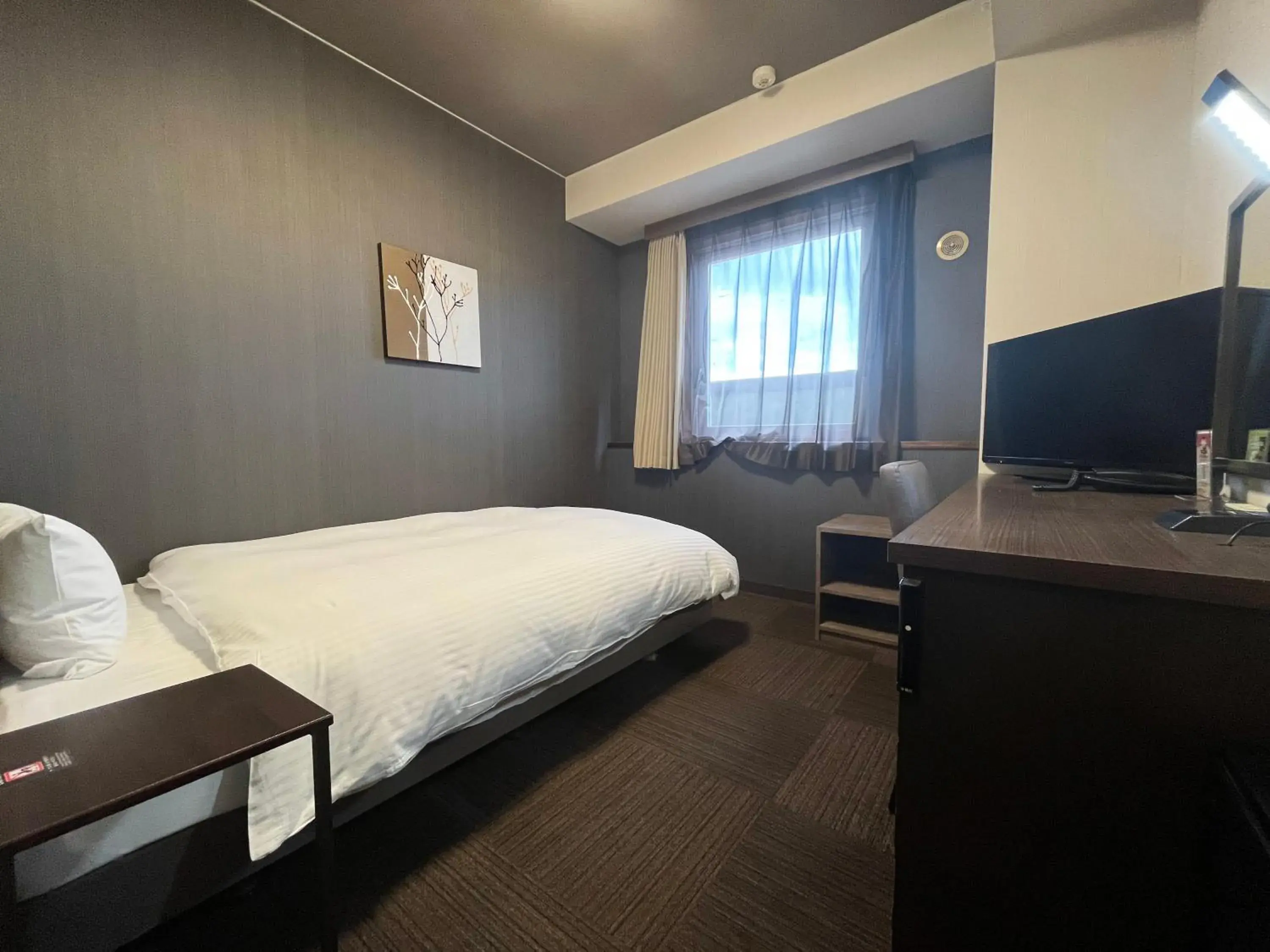 Photo of the whole room, Bed in Hotel Route-Inn Susono Inter Photo of the whole room, Bed in Hotel Route-Inn Susono Inter