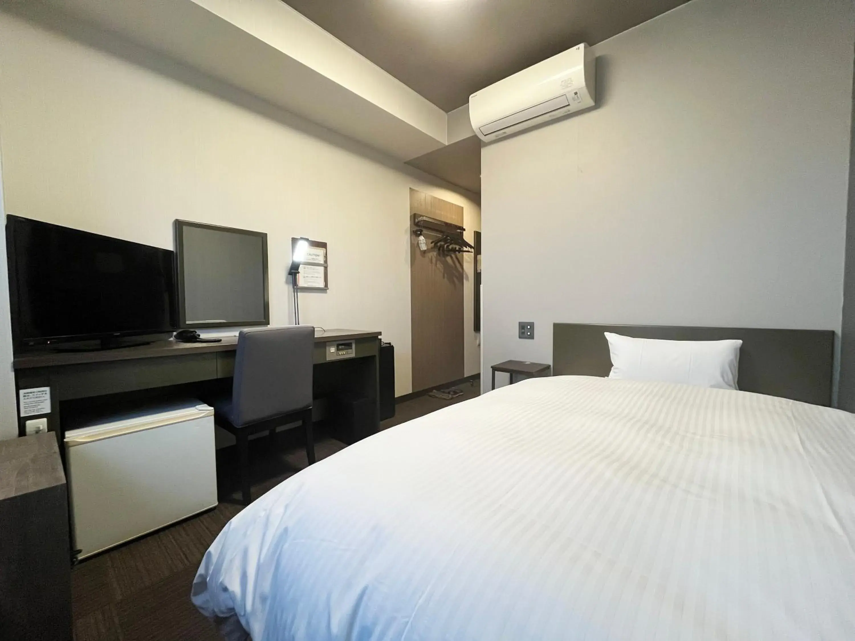 Photo of the whole room, Bed in Hotel Route-Inn Susono Inter Photo of the whole room, Bed in Hotel Route-Inn Susono Inter