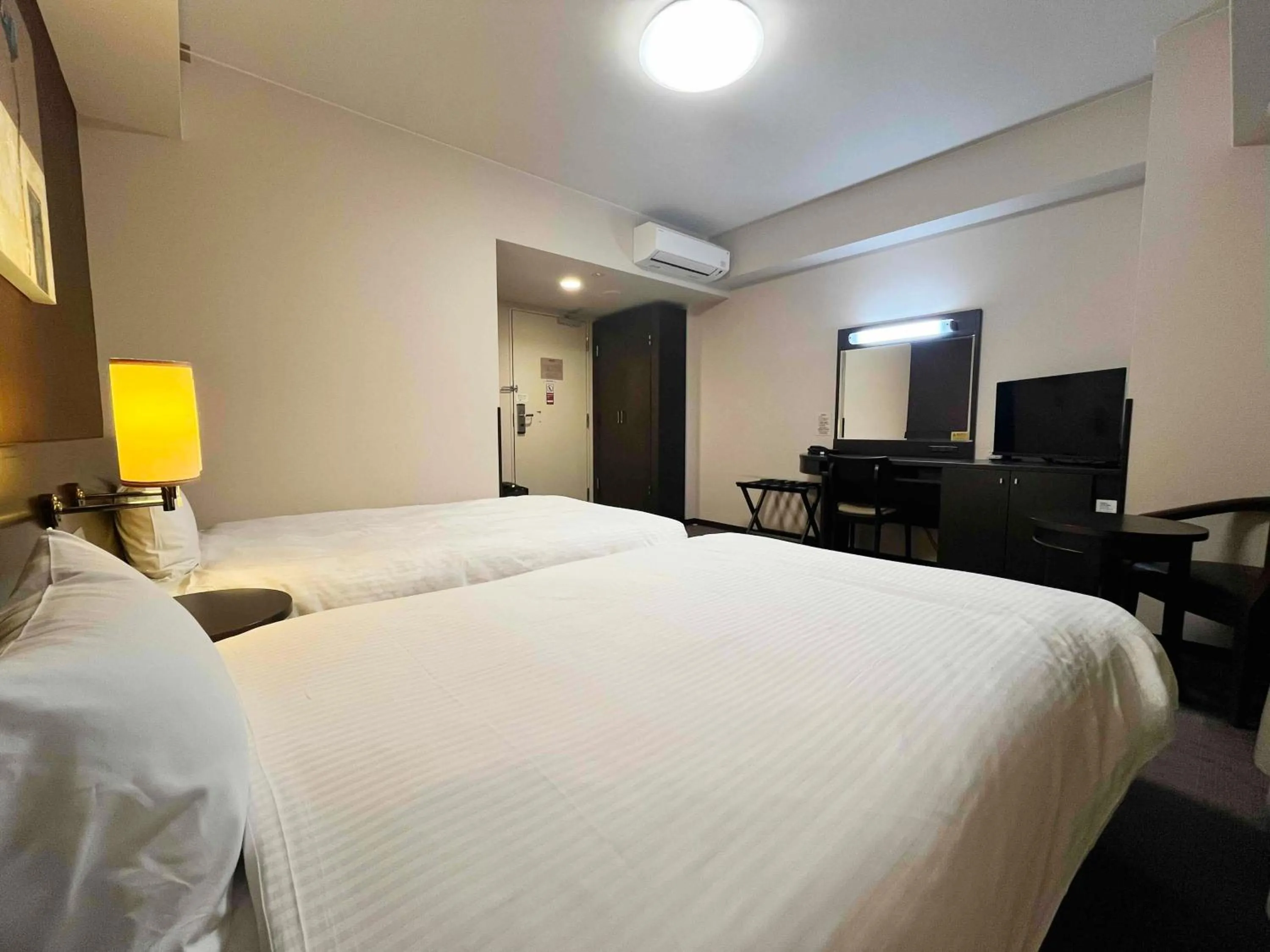 Photo of the whole room, Bed in Hotel Route-Inn Noshiro