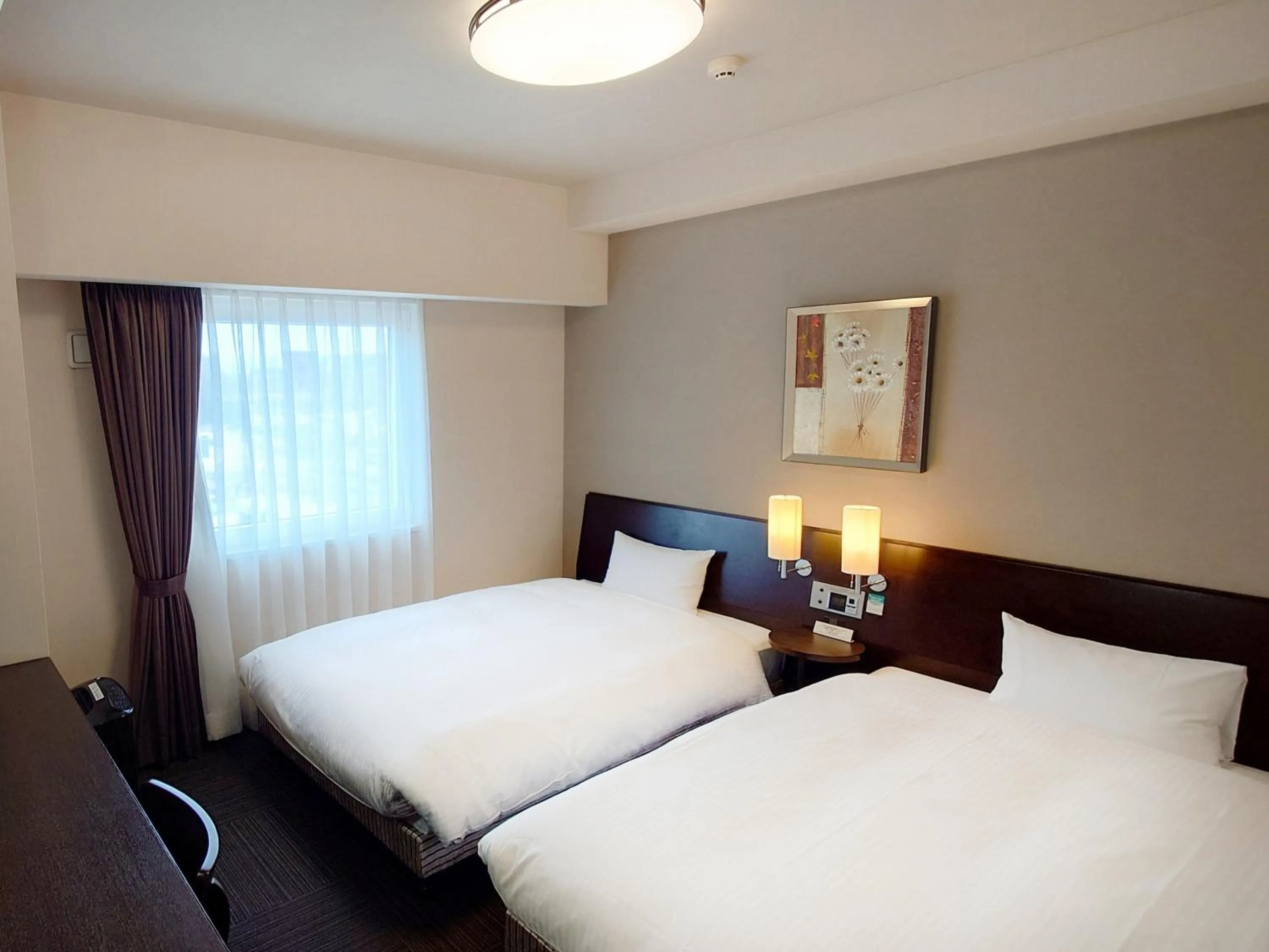 Photo of the whole room, Bed in Hotel Route-Inn Yurihonjo