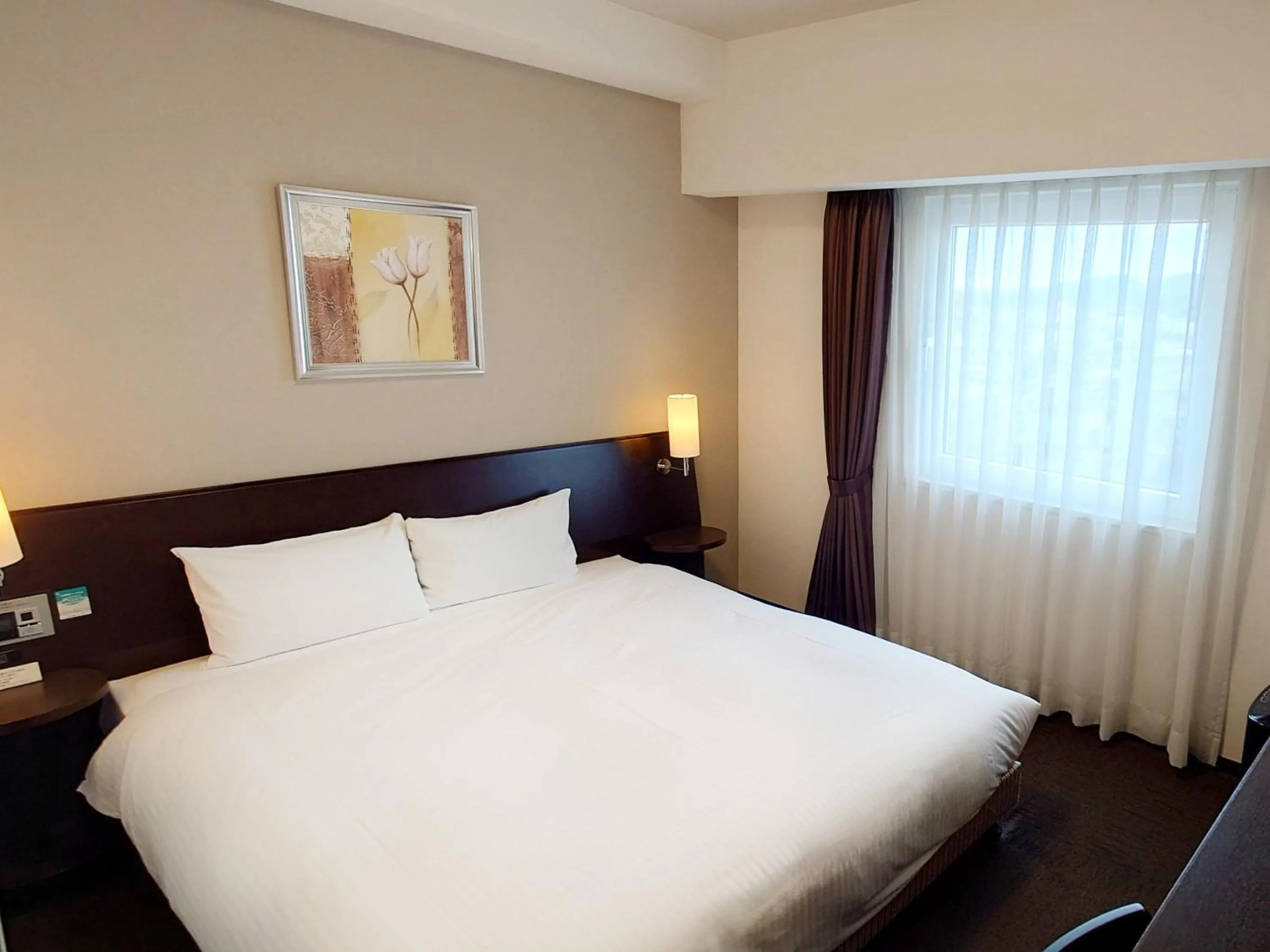 Photo of the whole room, Bed in Hotel Route-Inn Yurihonjo