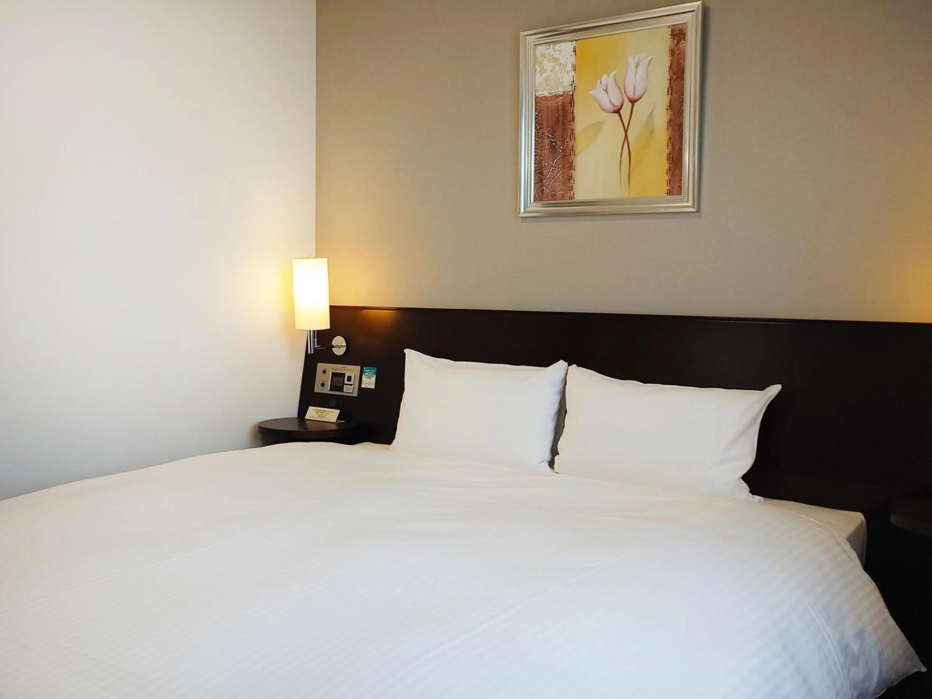 Photo of the whole room, Bed in Hotel Route-Inn Yurihonjo