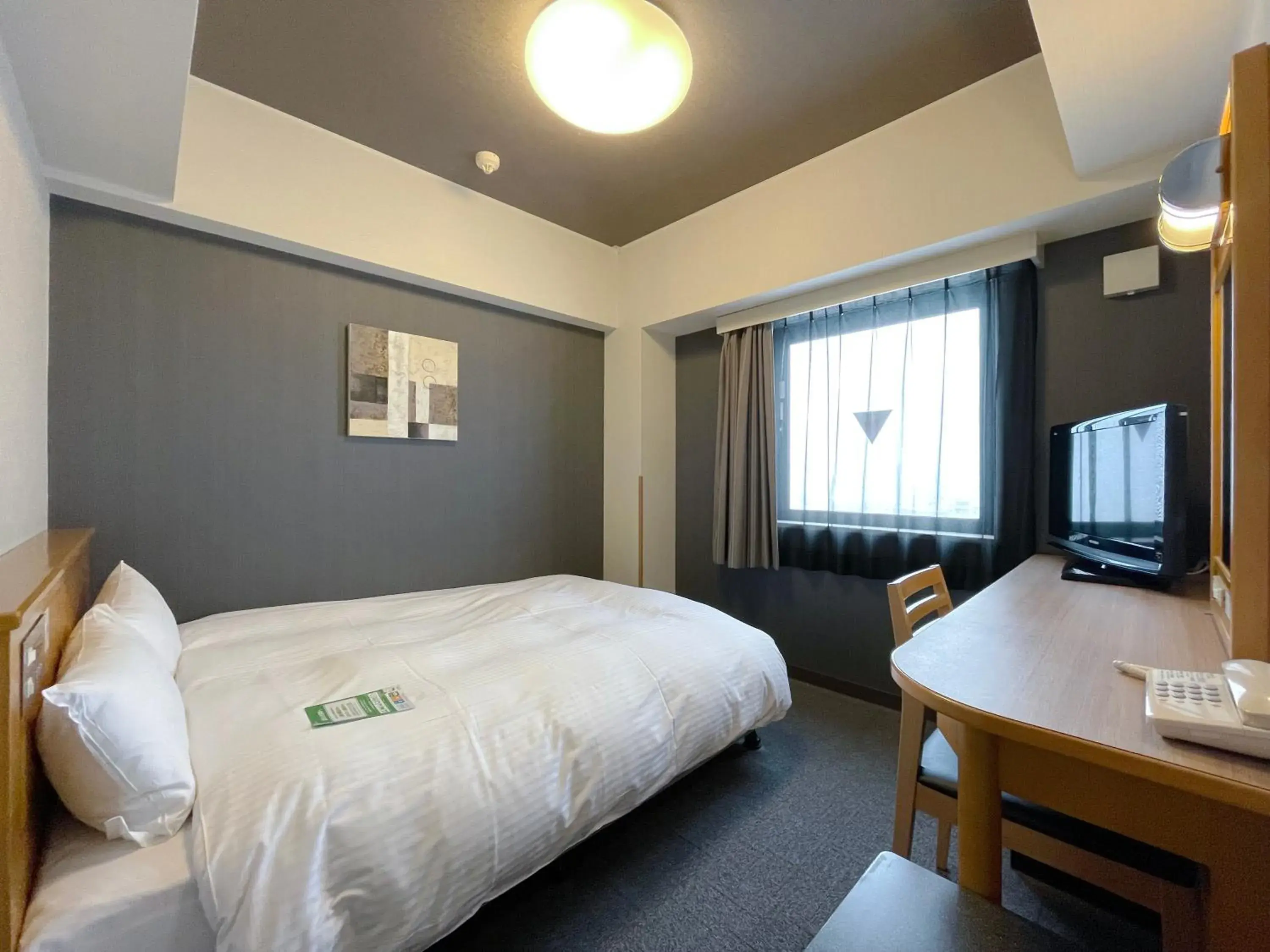 Photo of the whole room, Bed in Hotel Route-Inn Yokote Inter Photo of the whole room, Bed in Hotel Route-Inn Yokote Inter