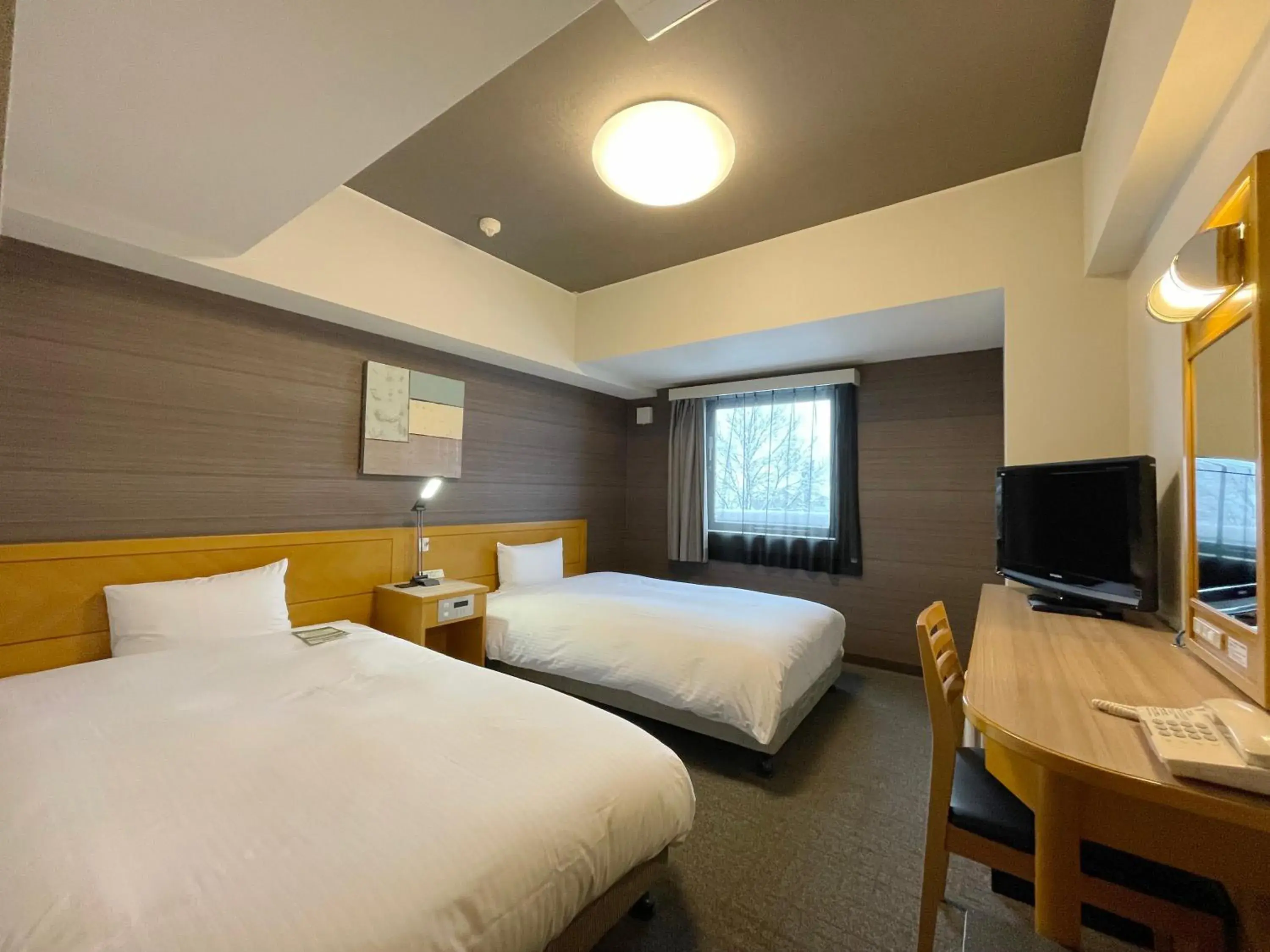 Photo of the whole room, Bed in Hotel Route-Inn Yokote Inter Photo of the whole room, Bed in Hotel Route-Inn Yokote Inter
