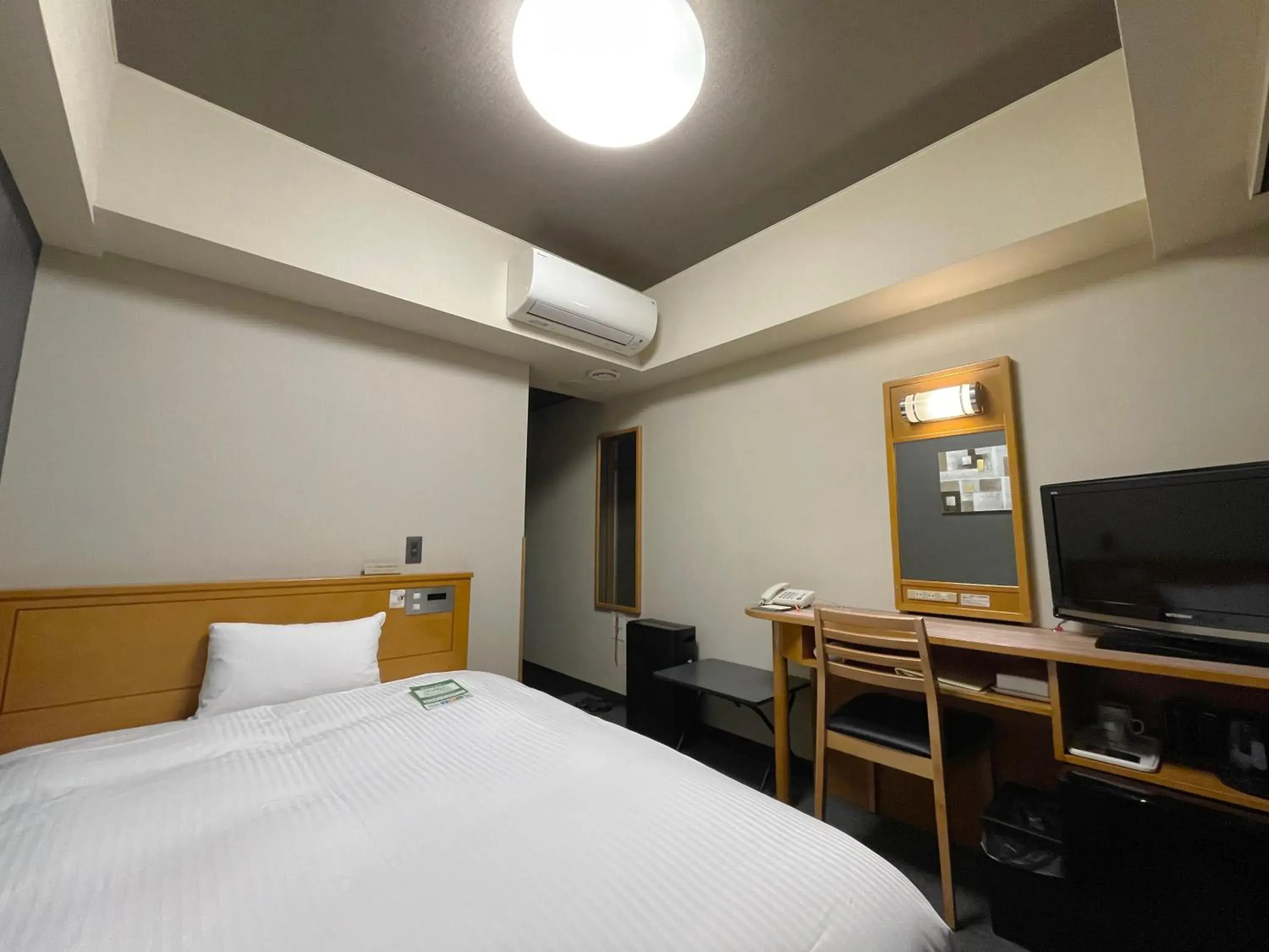 Photo of the whole room, Bed in Hotel Route-Inn Yokote Inter Photo of the whole room, Bed in Hotel Route-Inn Yokote Inter