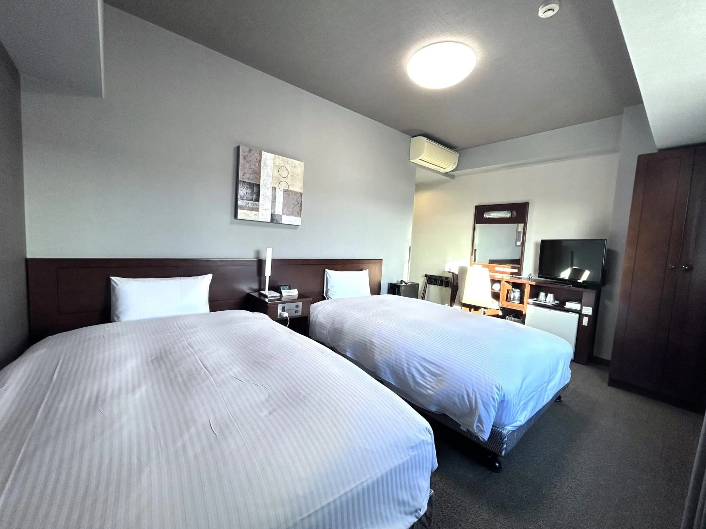 Photo of the whole room, Bed in Hotel Route-Inn Morioka Minami Inter