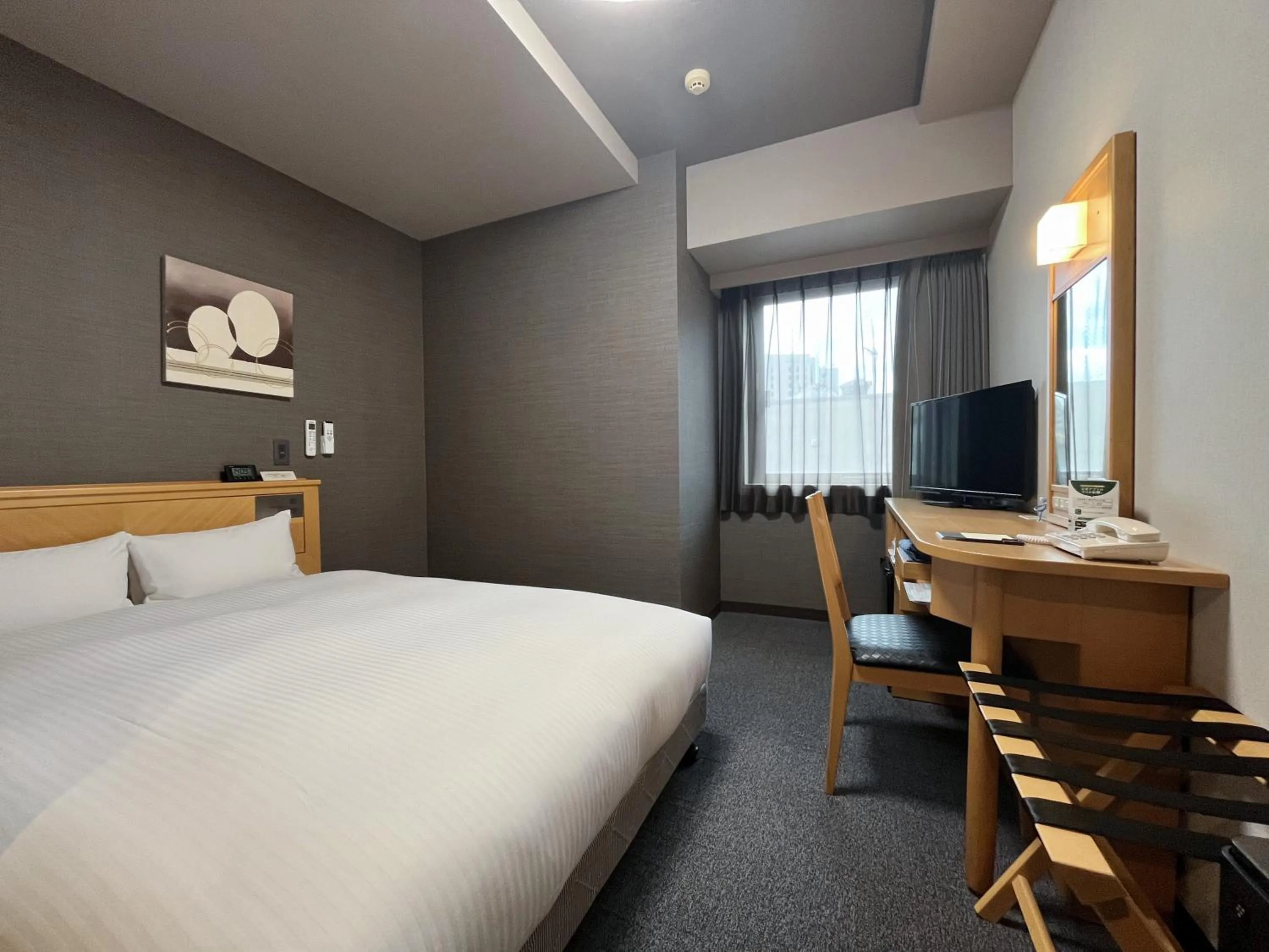 Photo of the whole room, Bed in Hotel Route-Inn Morioka Ekimae