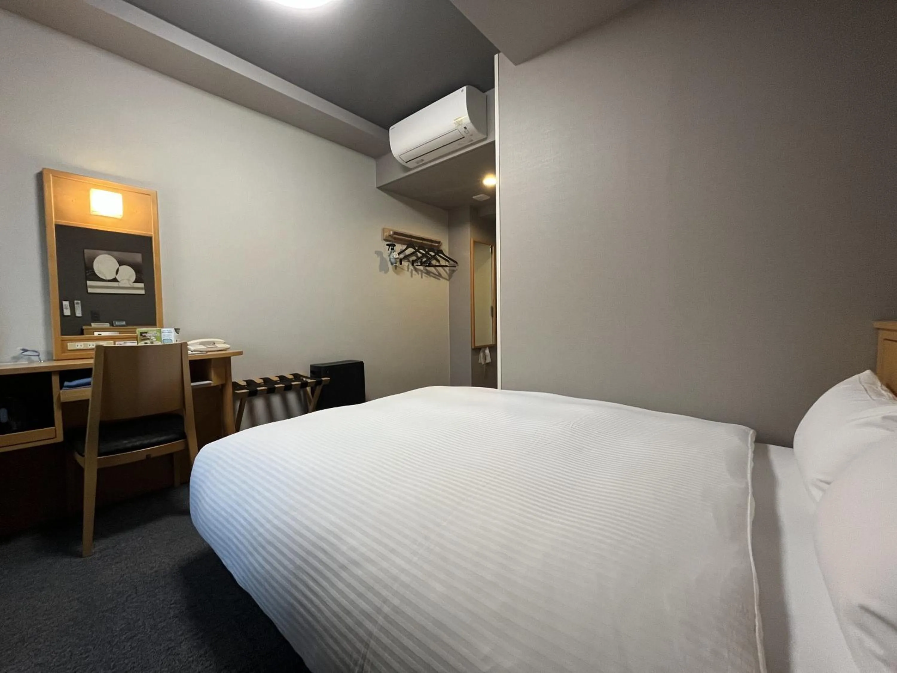 Photo of the whole room, Bed in Hotel Route-Inn Morioka Ekimae